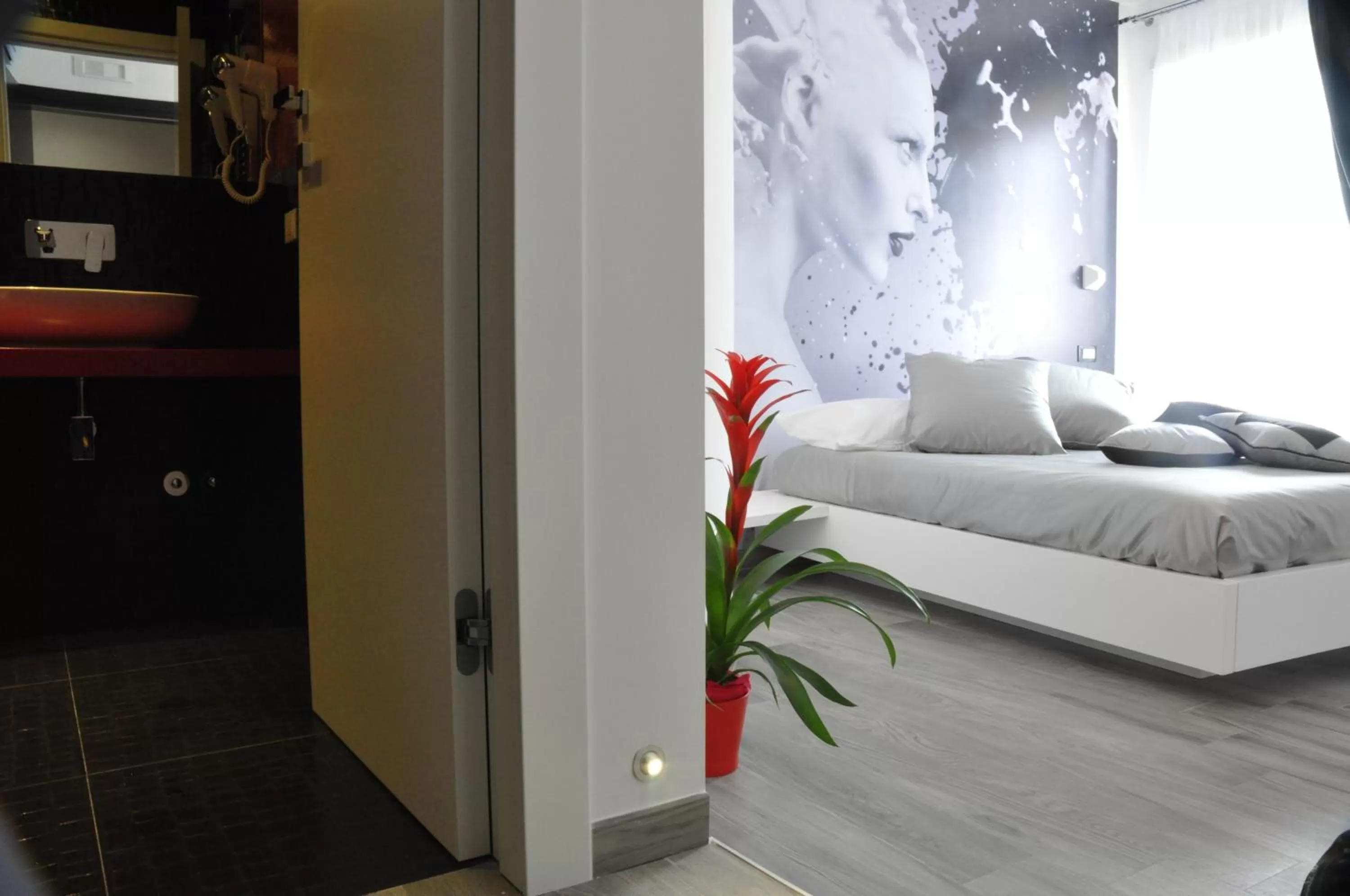 Photo of the whole room, Bed in Caos Calmo