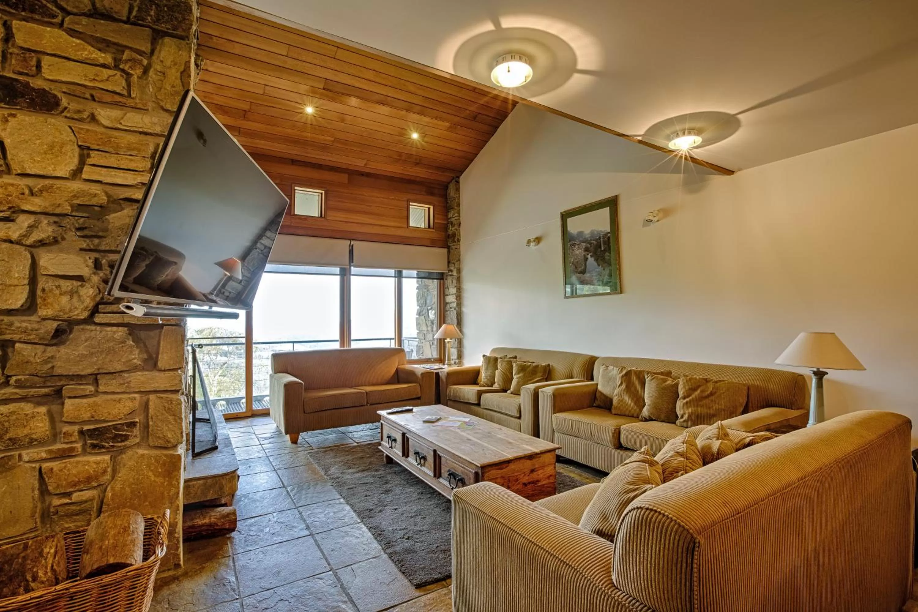 Living room, Seating Area in Alpine Woodsmoke Apartments