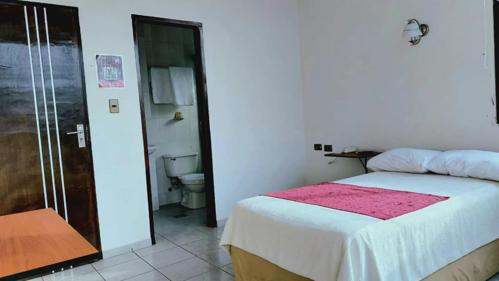 Bed in Hotel Plaza Center