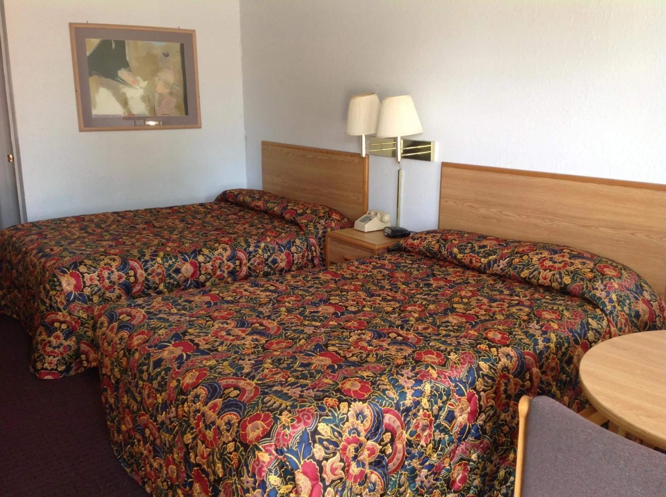 Bed in Knights Inn Muskogee
