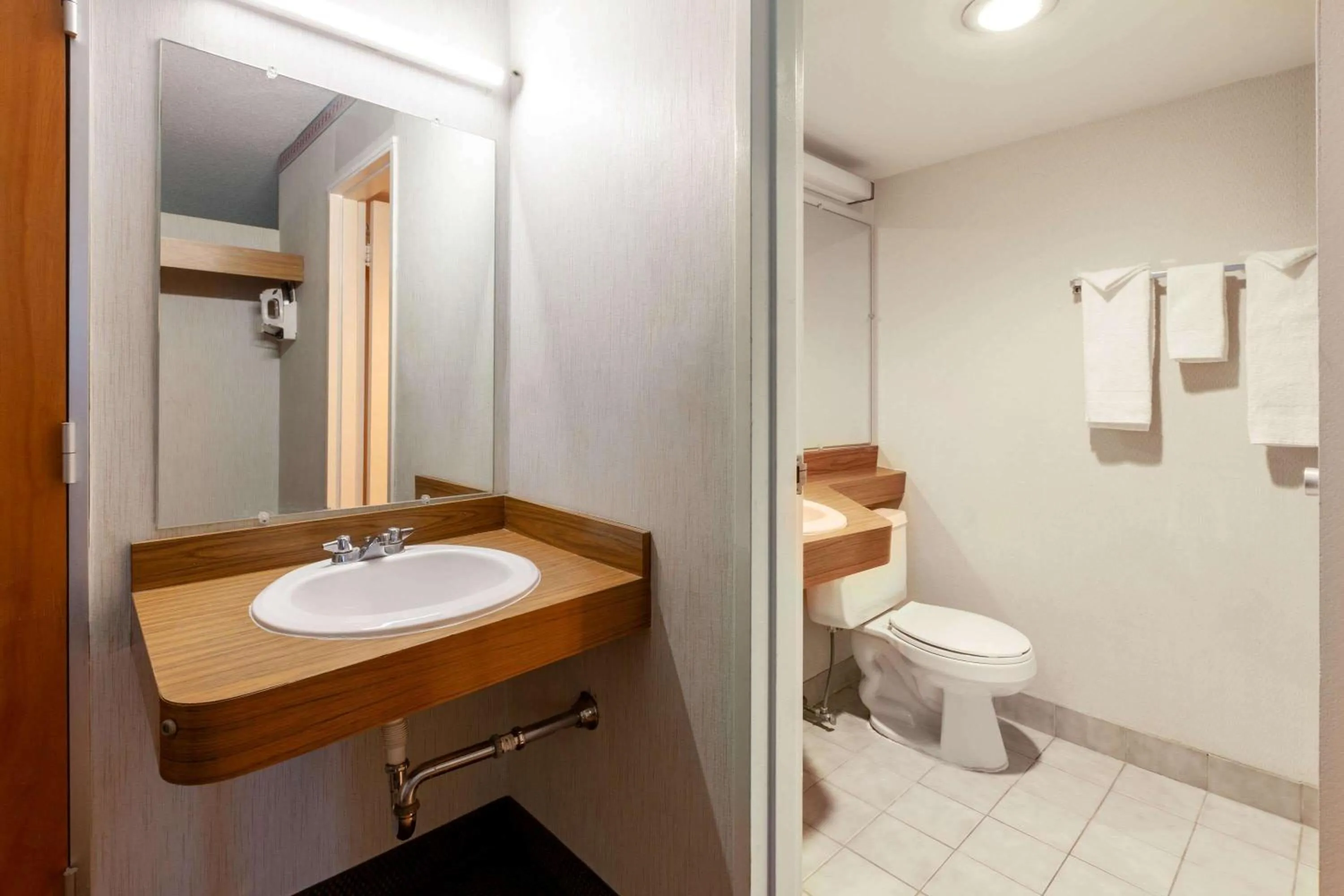 Bathroom in Travelodge by Wyndham Cleveland Airport