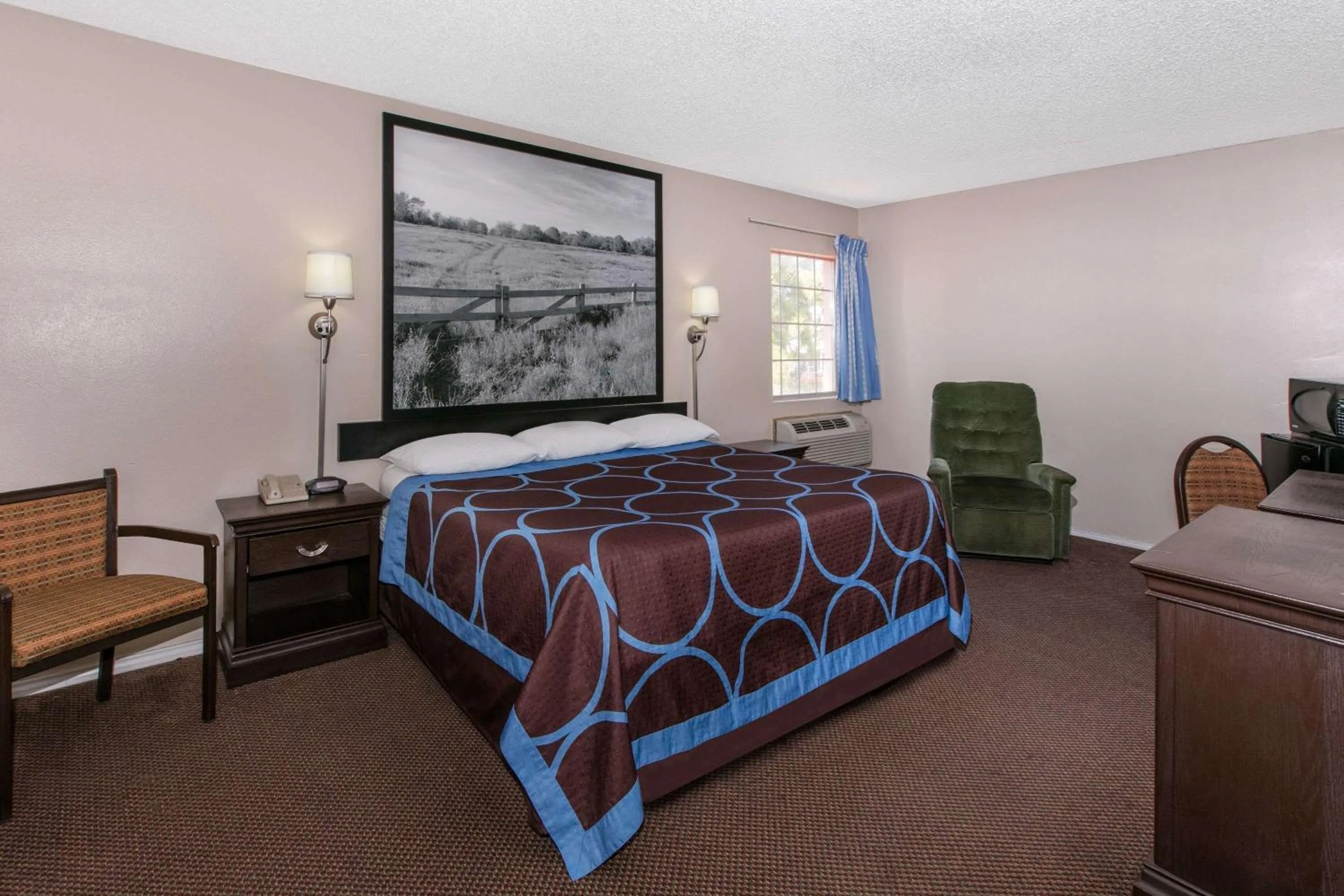 Photo of the whole room, Bed in Super 8 by Wyndham Lubbock Civic Center North