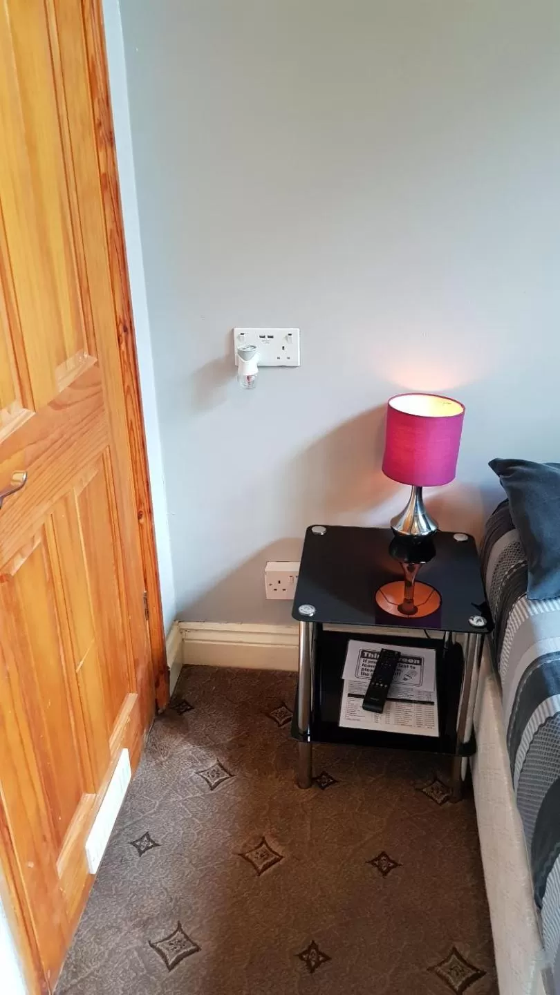 Bedroom in Hour Glass Hotel