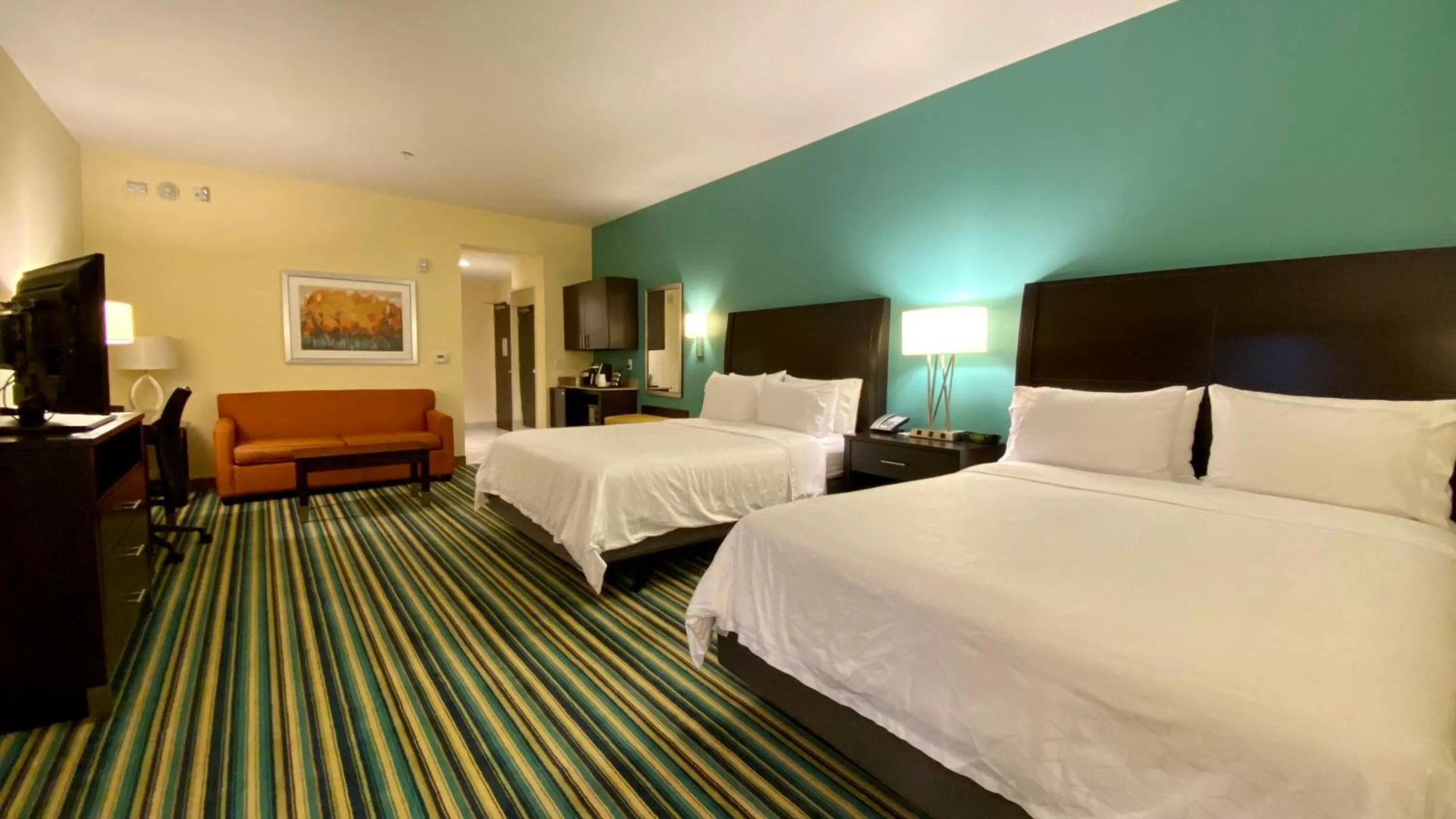 Photo of the whole room, Bed in Holiday Inn Express Hotel & Suites Orlando East-UCF Area by IHG