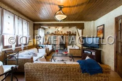 Communal lounge/ TV room, Bed in Posada el Campanario