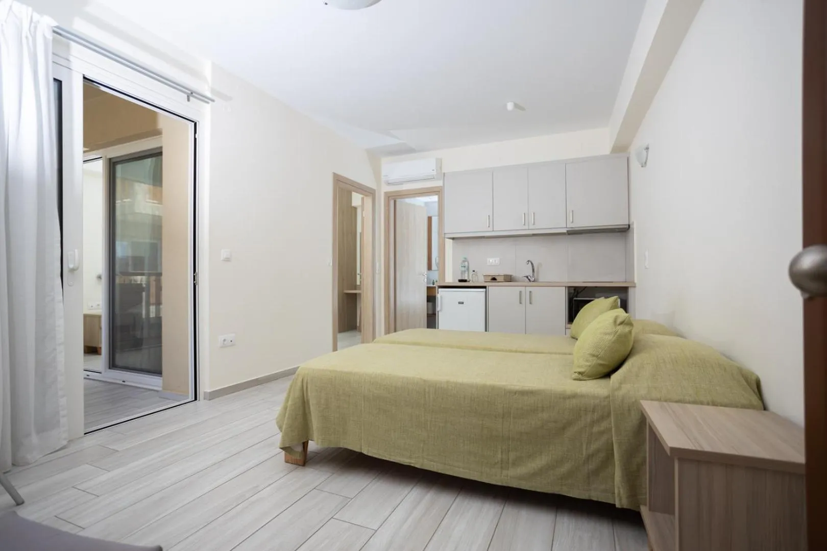 Bed in Ilian Beach & Apartments