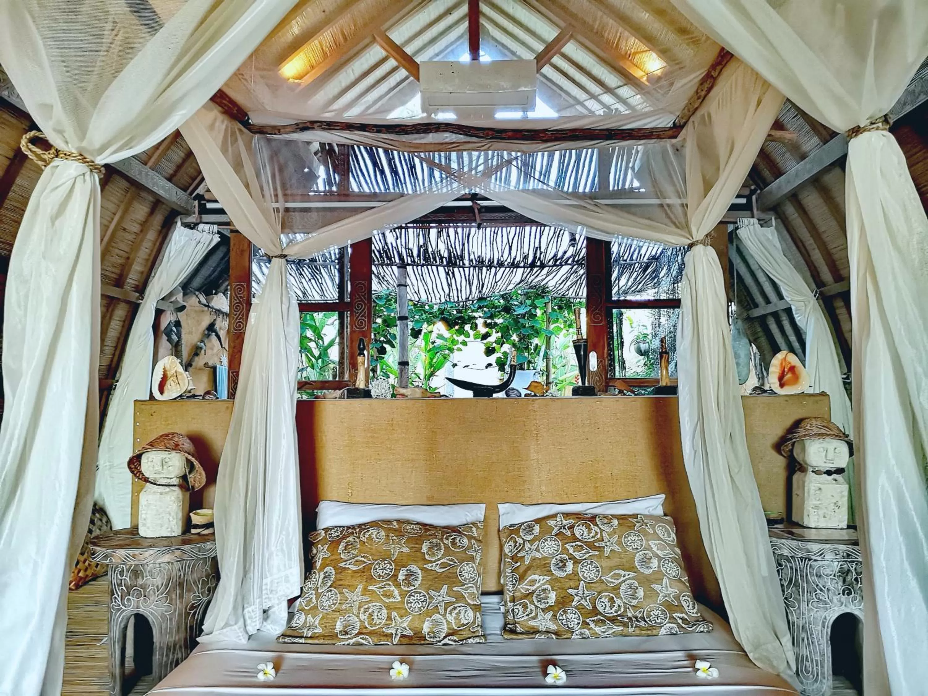 Bed in Coconut Garden Beach Resort