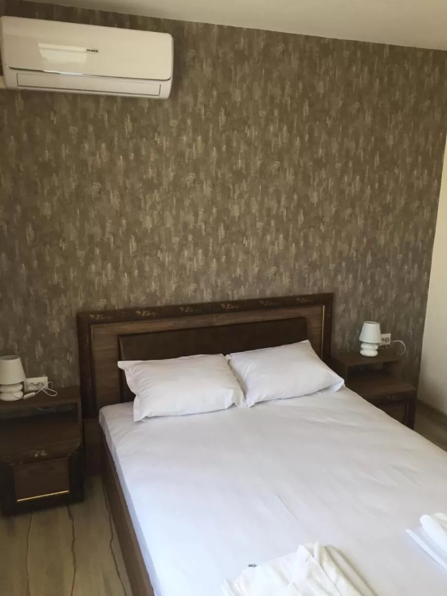 Bed in Family Hotel Malibu