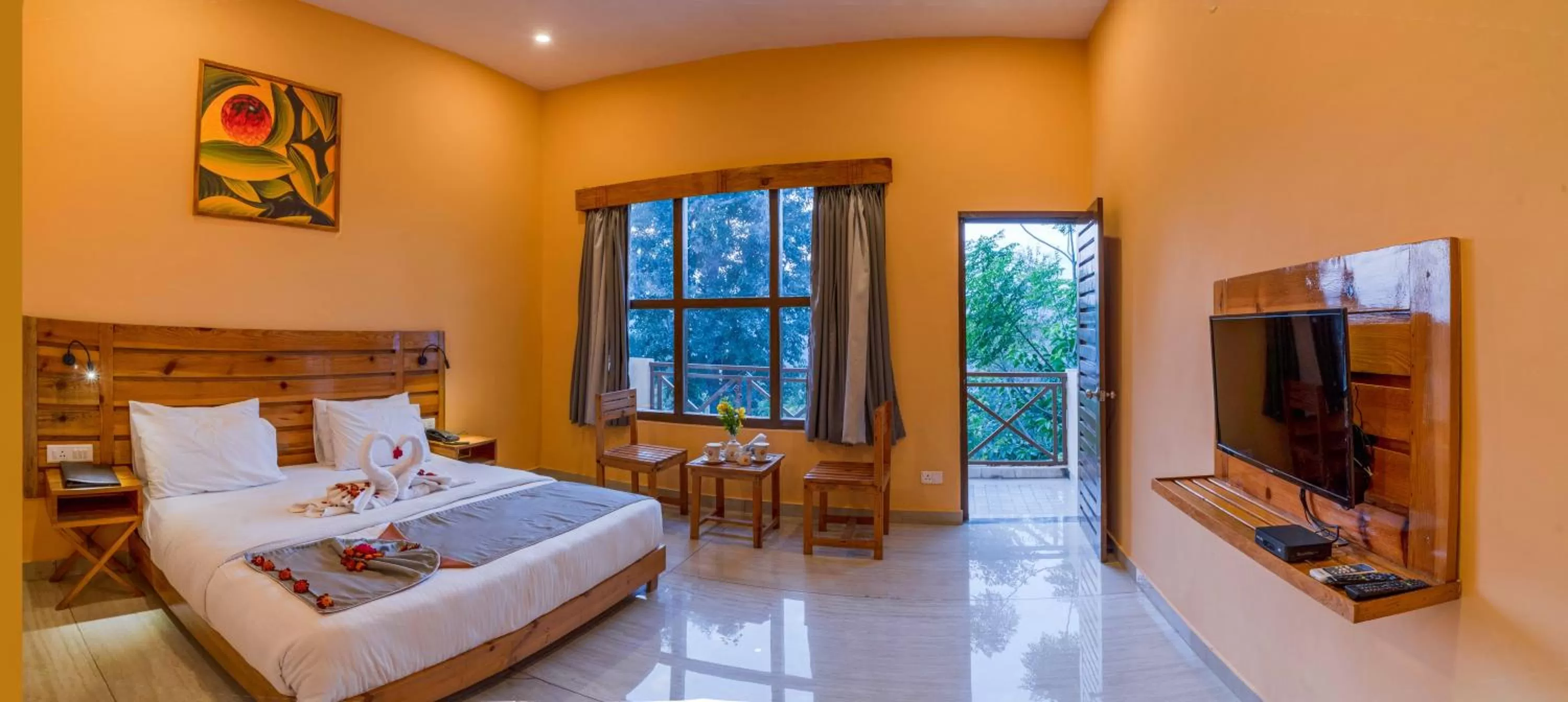 Communal lounge/ TV room, Bed in LaHermitage Resort