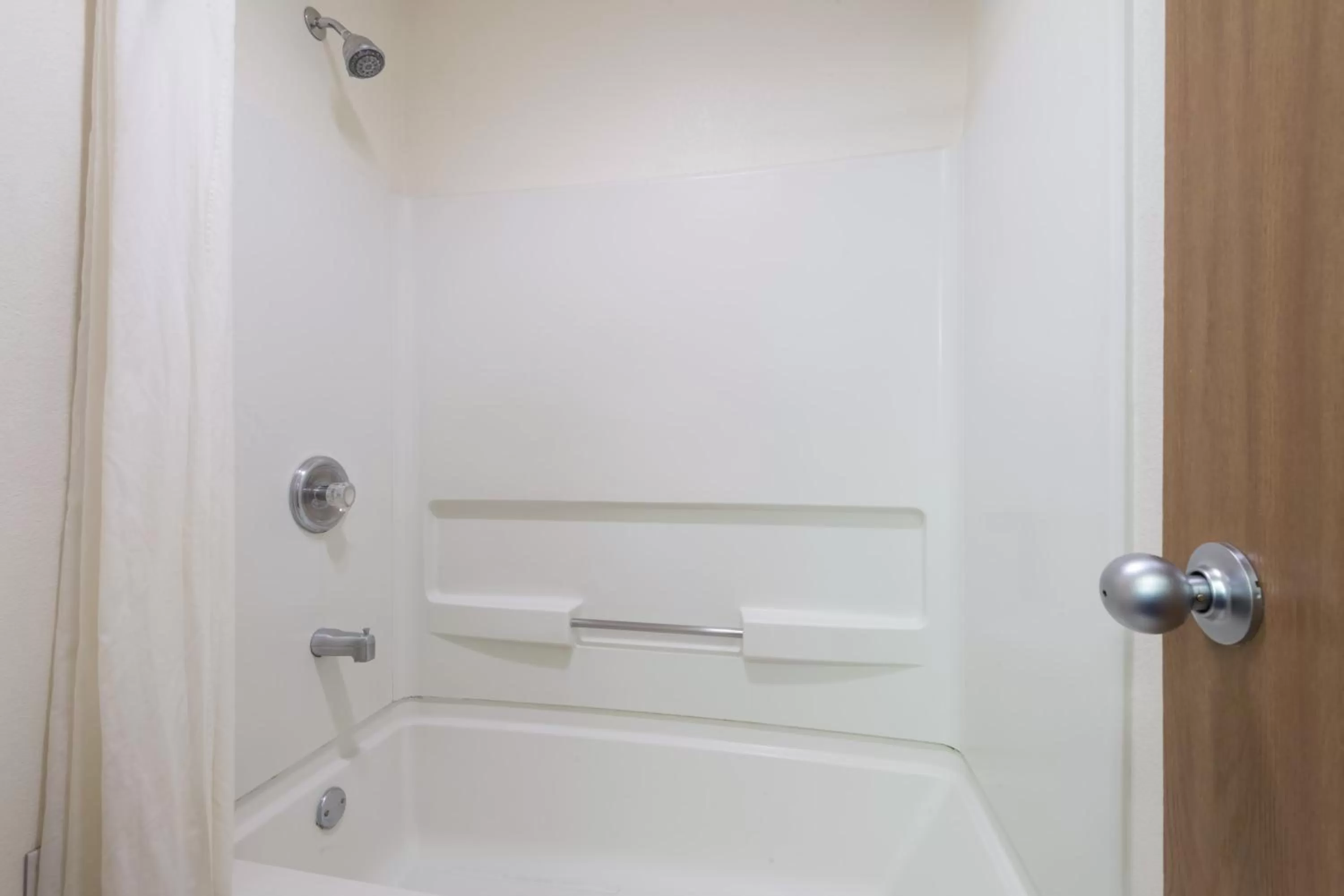 Bathroom in Super 8 by Wyndham Bernalillo