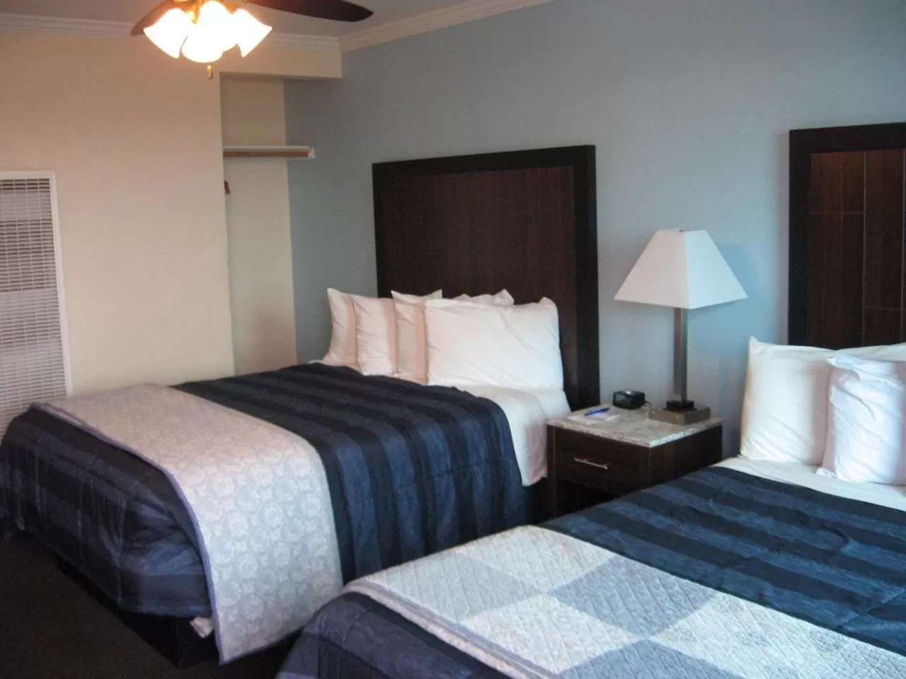 Bed in Dolphin Cove Motel