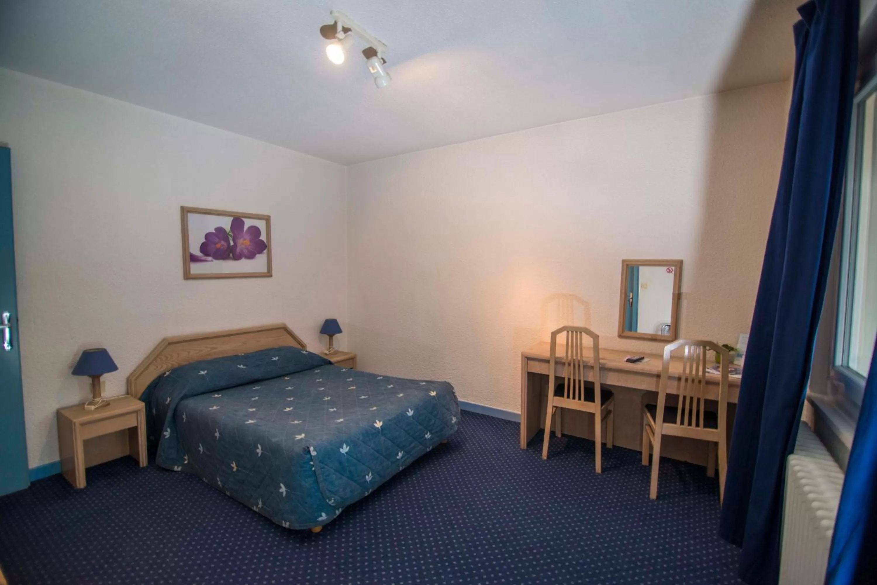 Photo of the whole room, Bed in Hôtel de La Poste