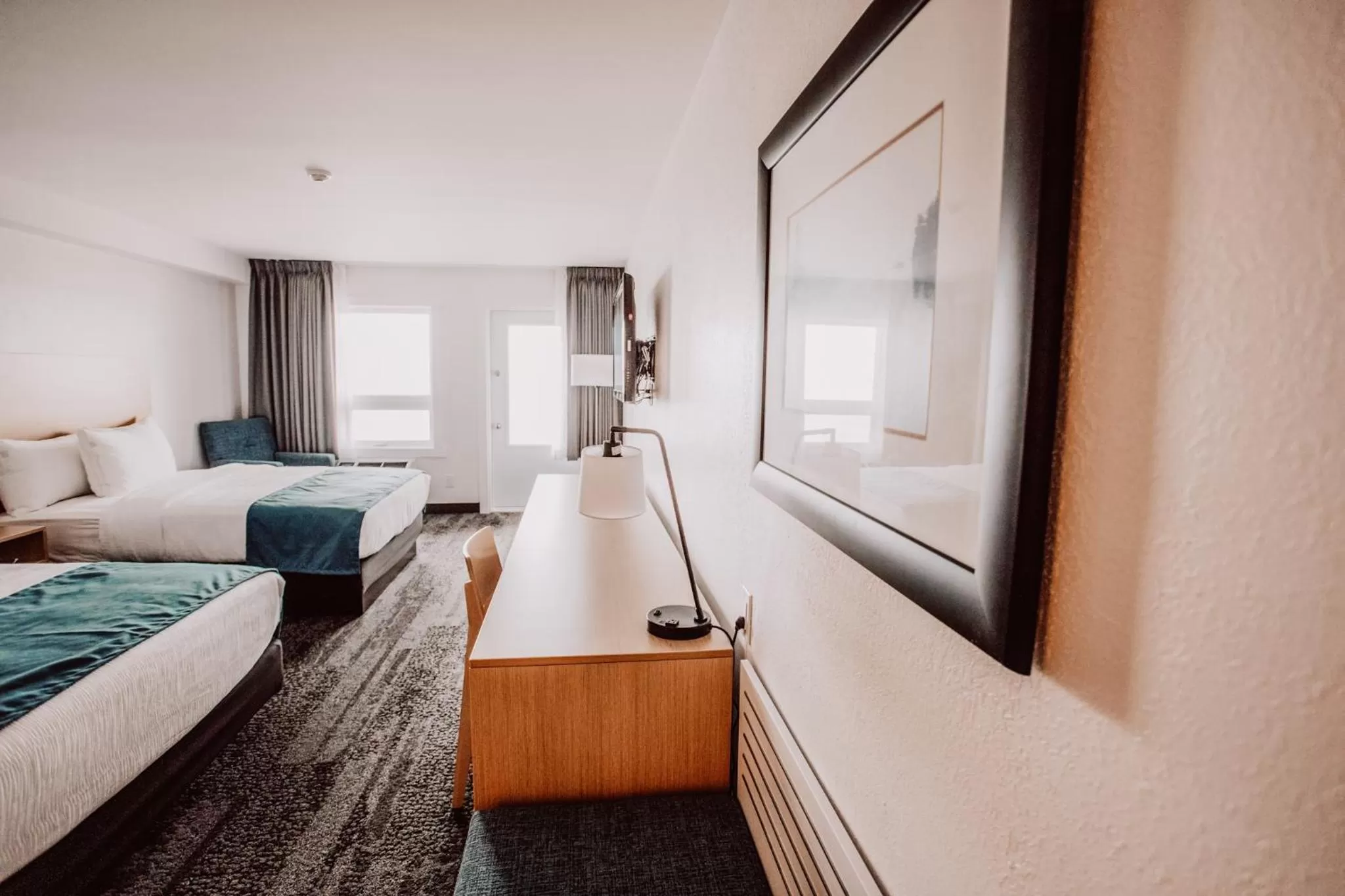 Bed in La Place Rendez-Vous Hotel