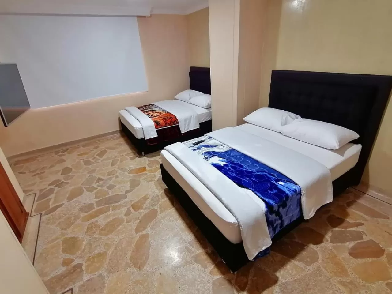 Bed in HOTEL GOLDEN SUITE