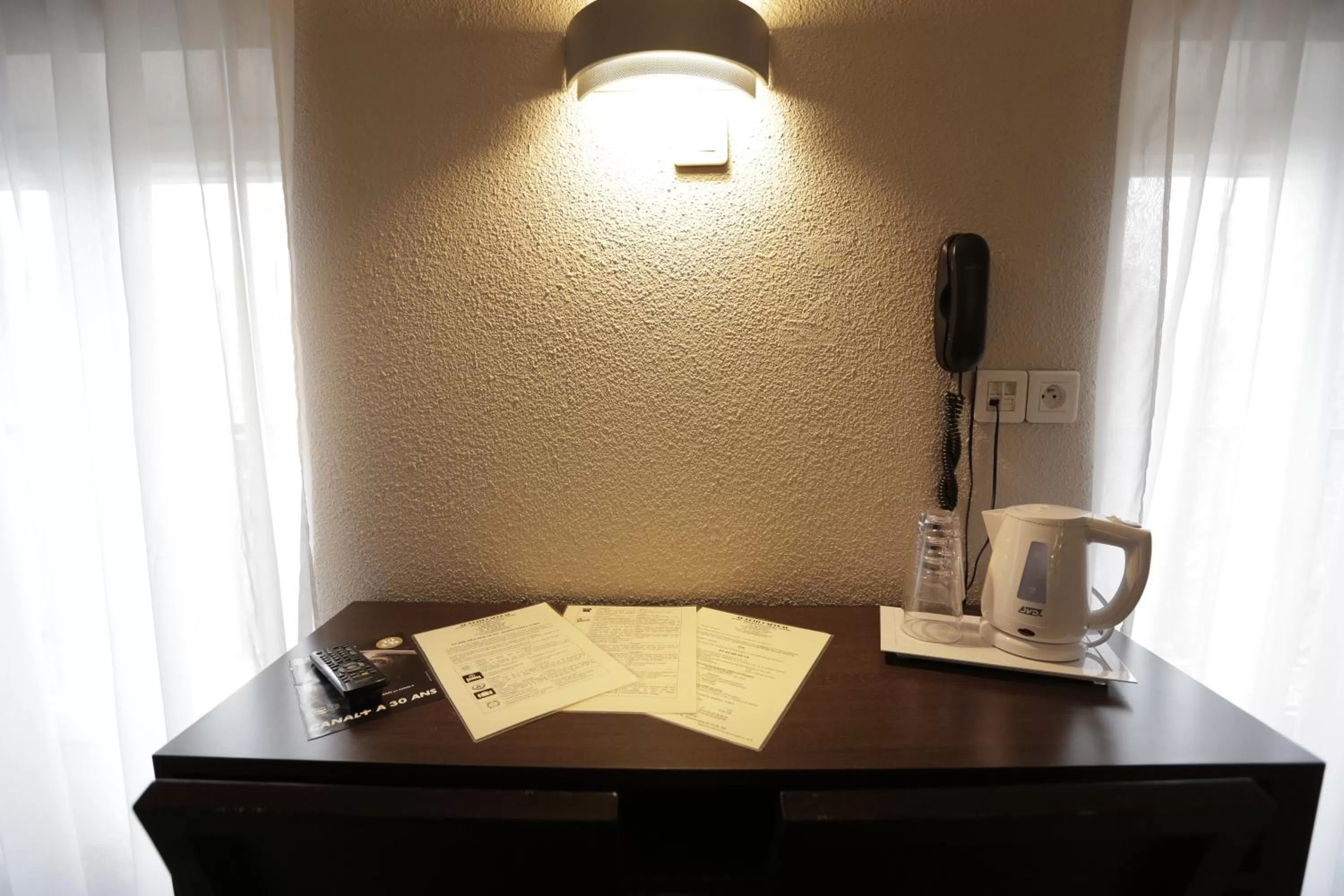 Seating area in Hôtel Au Petit Caporal