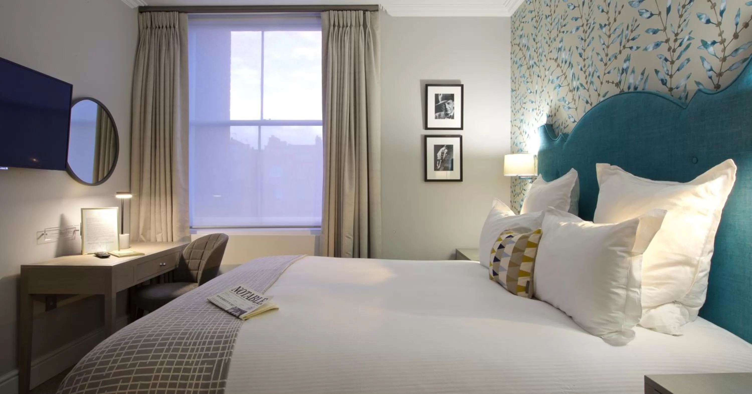 Bed in 54 Queen's Gate Hotel