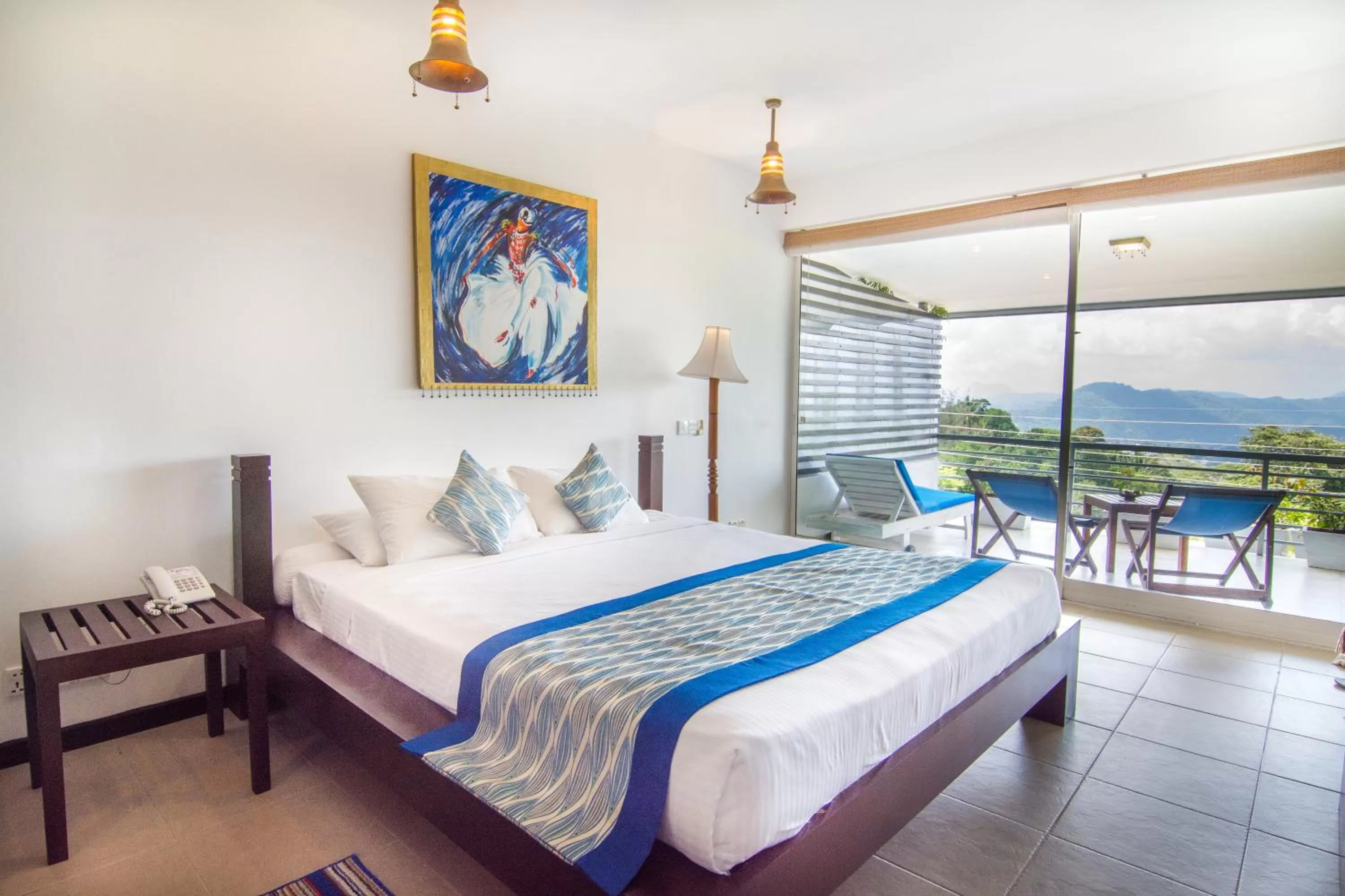 Photo of the whole room, Bed in The Theva Residency