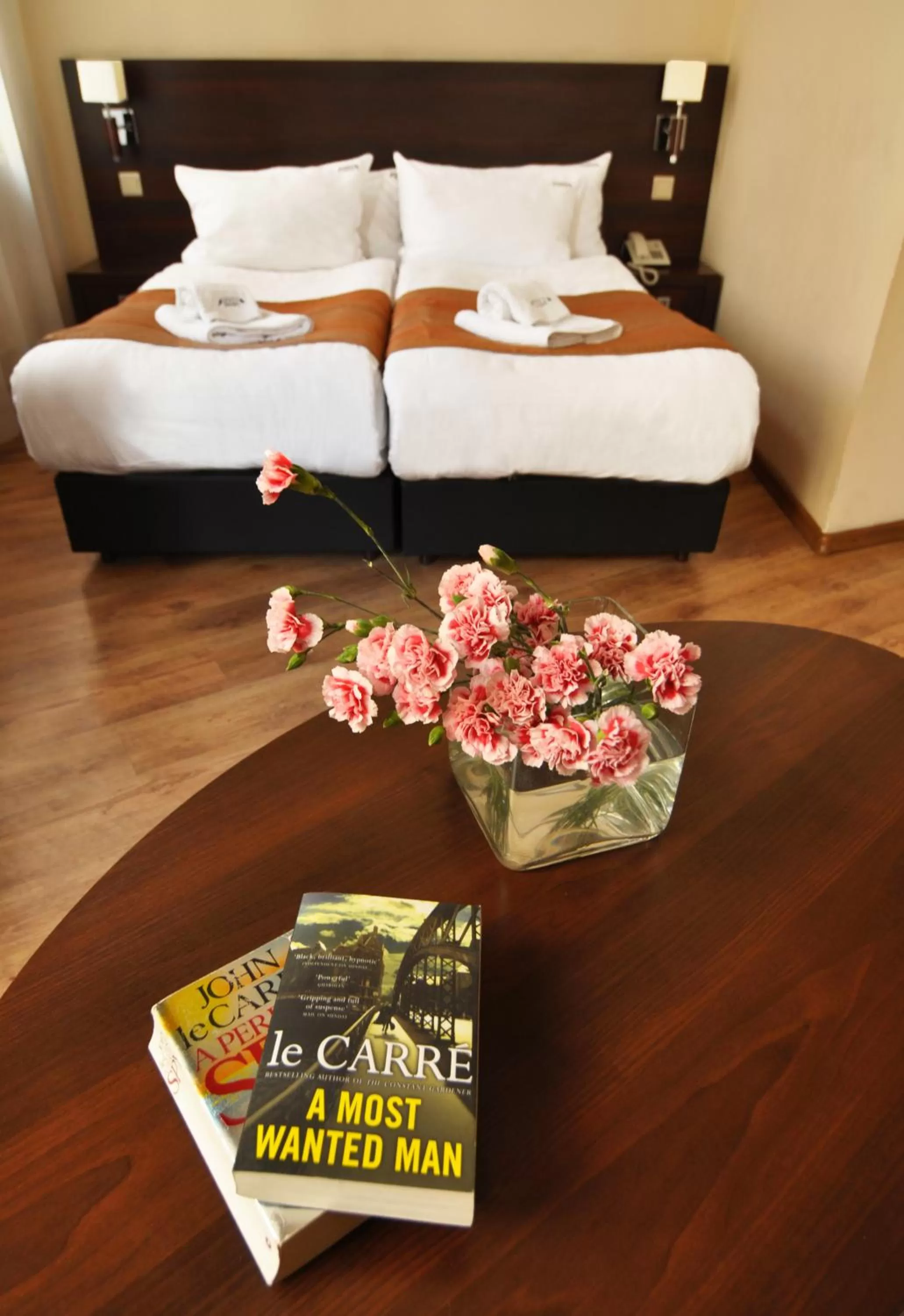 Bed in Spatz Aparthotel