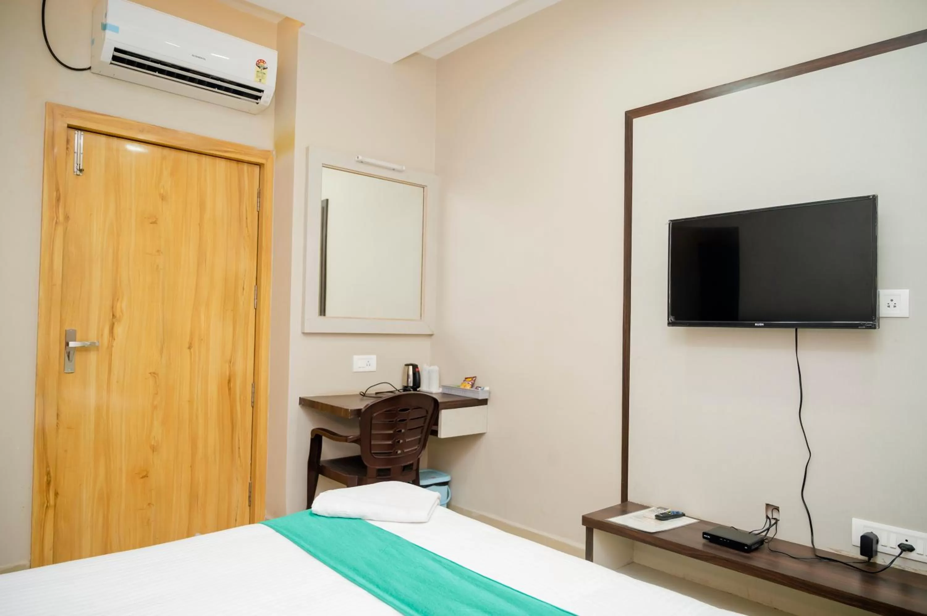 TV and multimedia, Bed in Hotel Green Apple