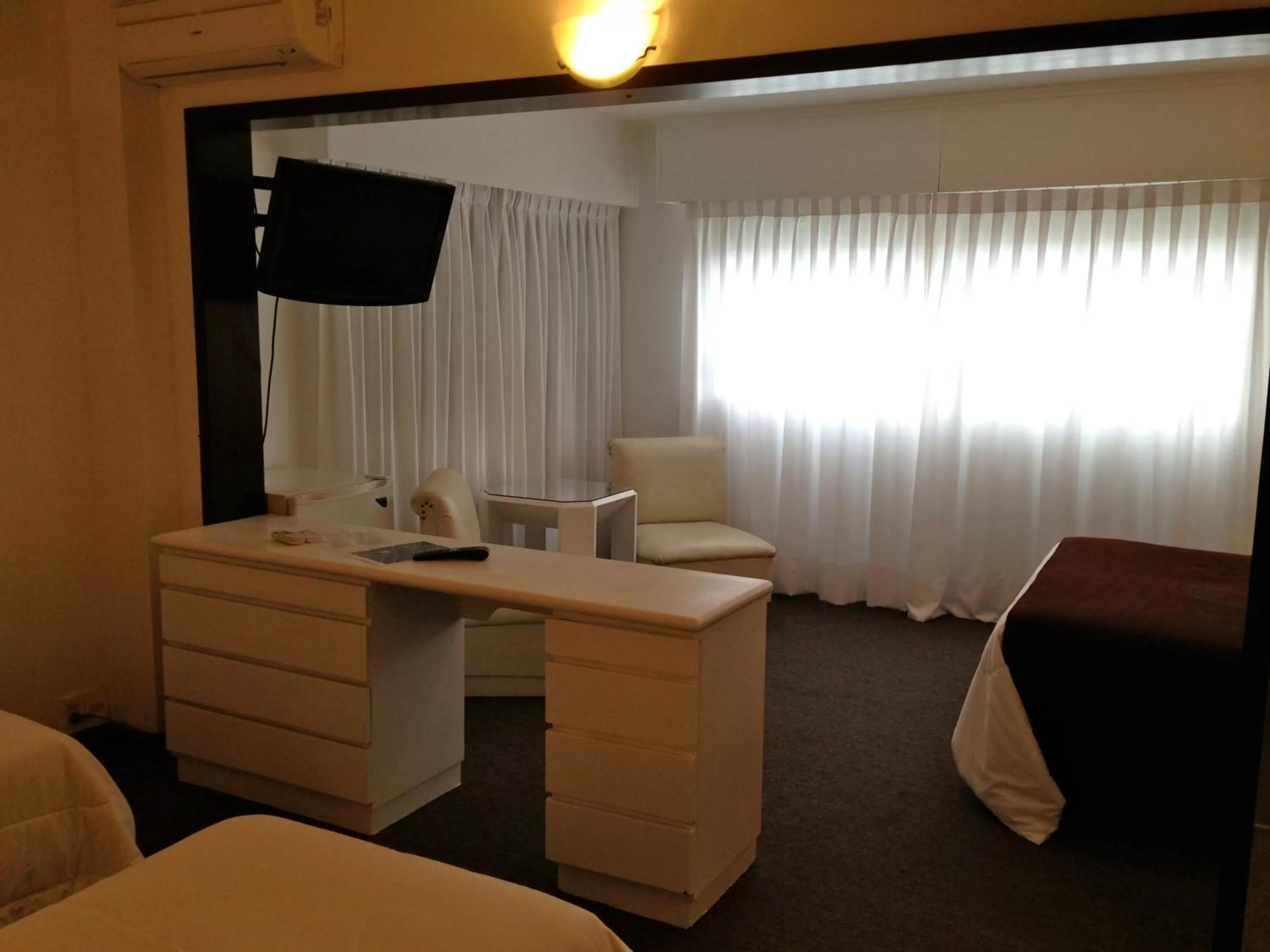 Seating area, Bed in Hotel Castilla