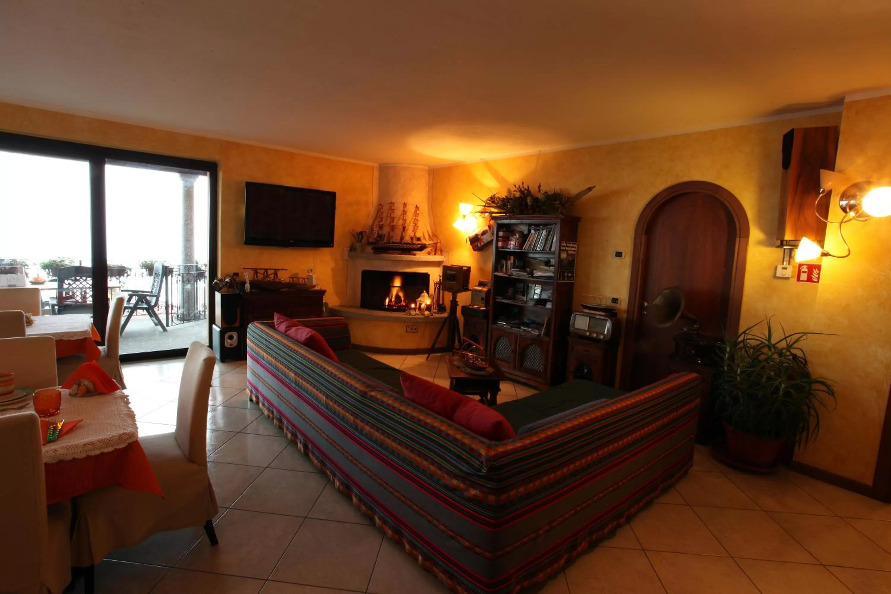 Communal lounge/ TV room, Bed in B&B Villa Anita