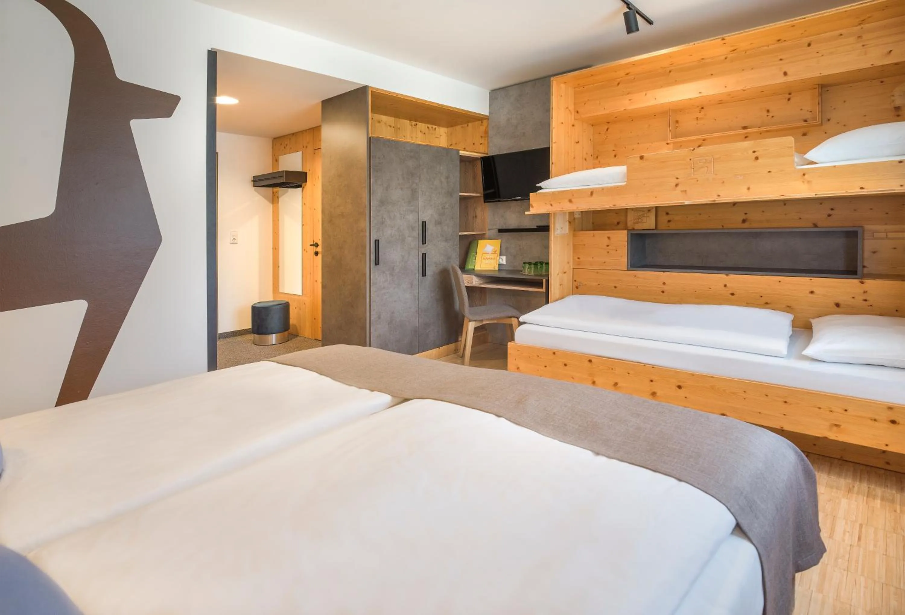 Photo of the whole room, Bed in JUFA Hotel Wipptal