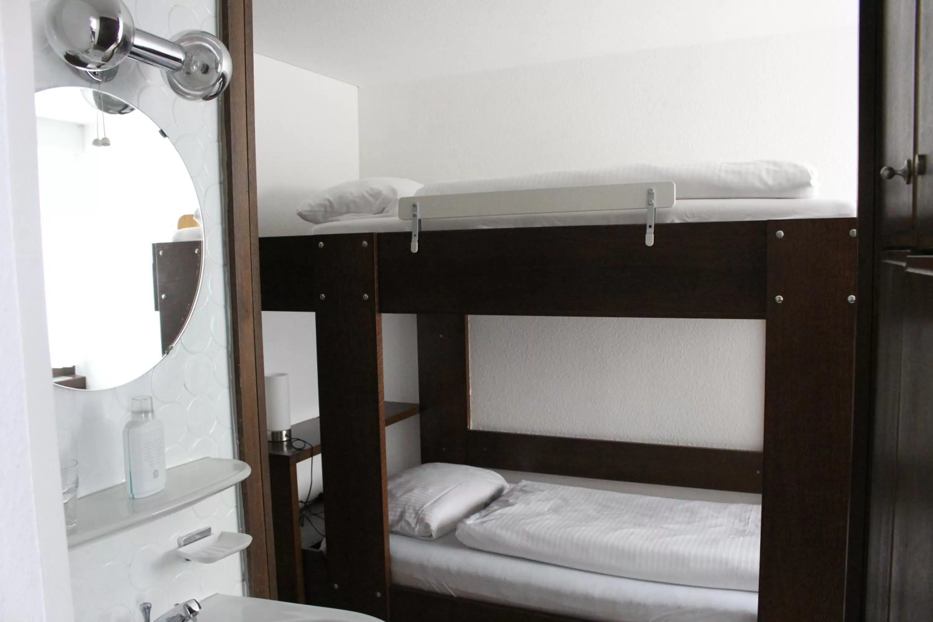 Bed in Hotel Ulmer Spatz