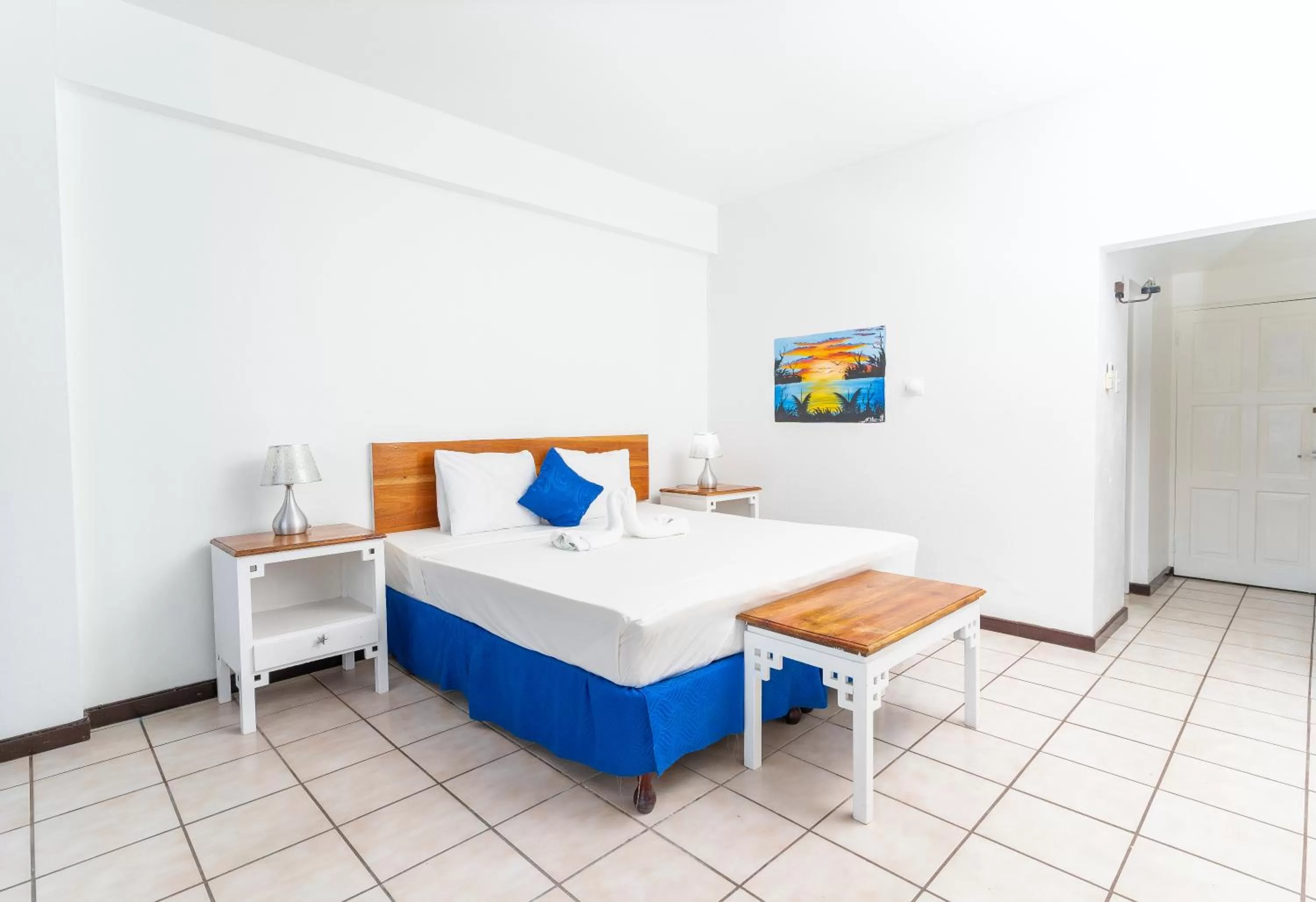 Bed in Sand and Tan Beach Hotel