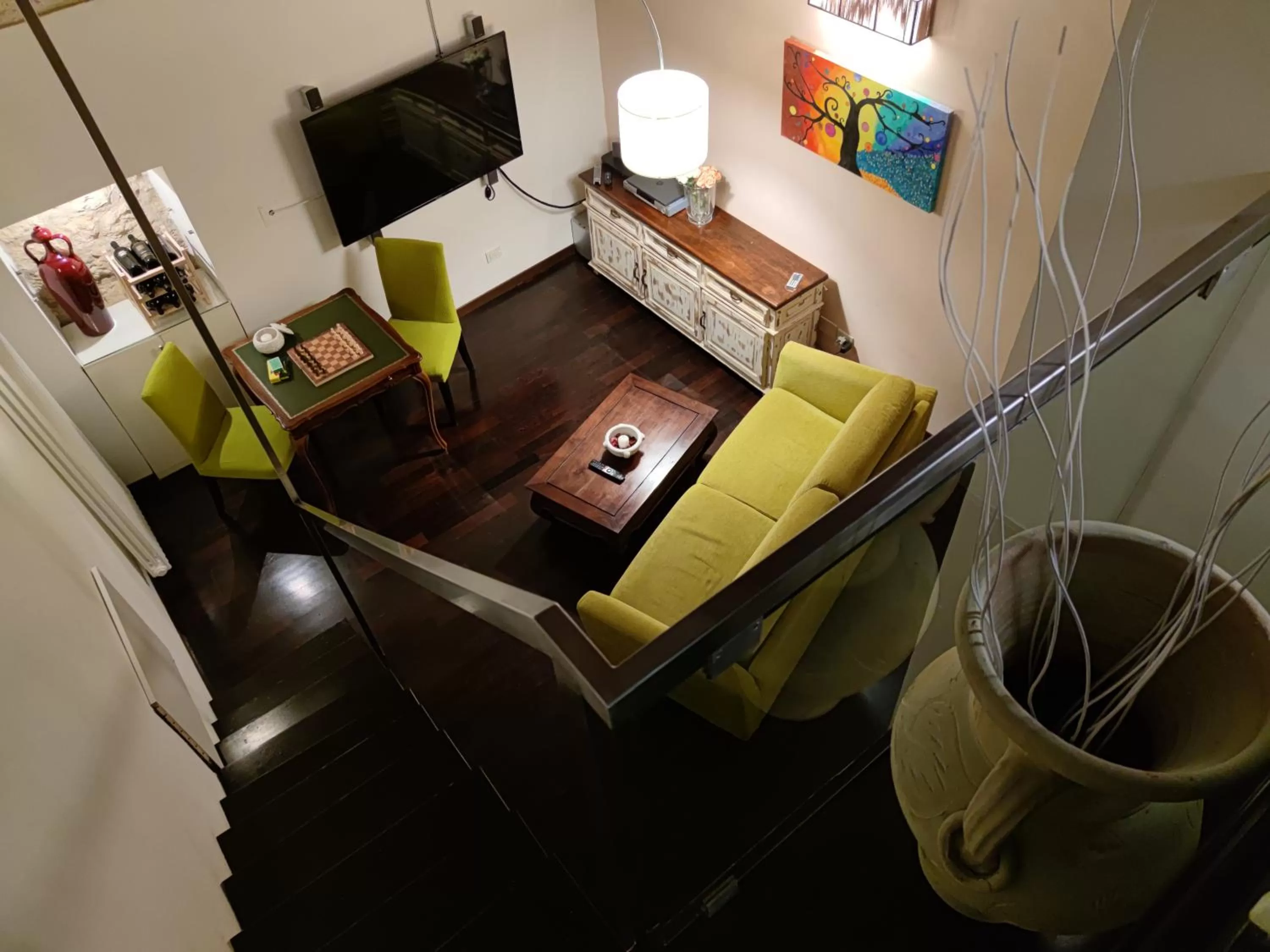 Communal lounge/ TV room in Dimora Arco Basso - Old Town