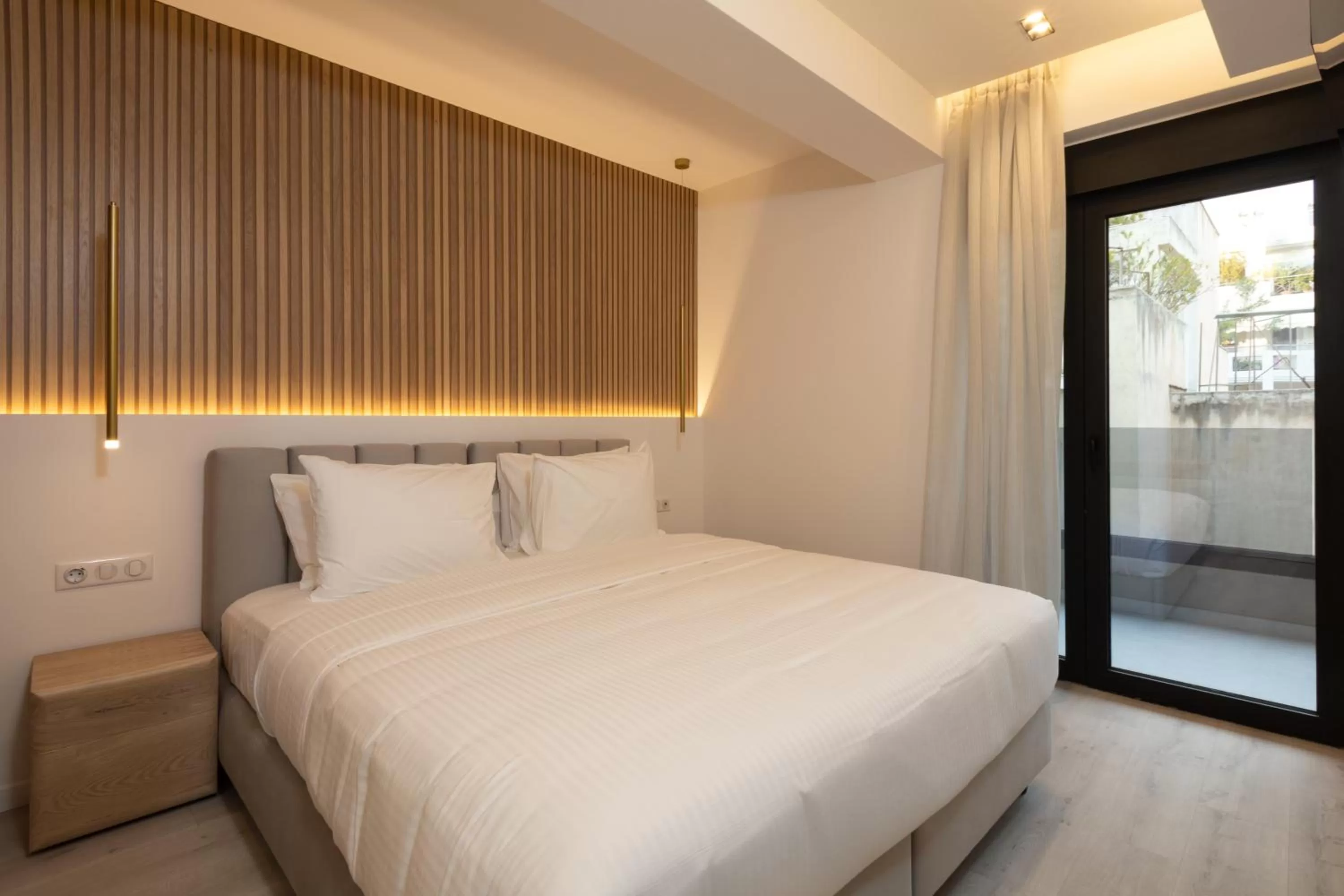 Bed in Incanto Boutique Suites - Neos Kosmos