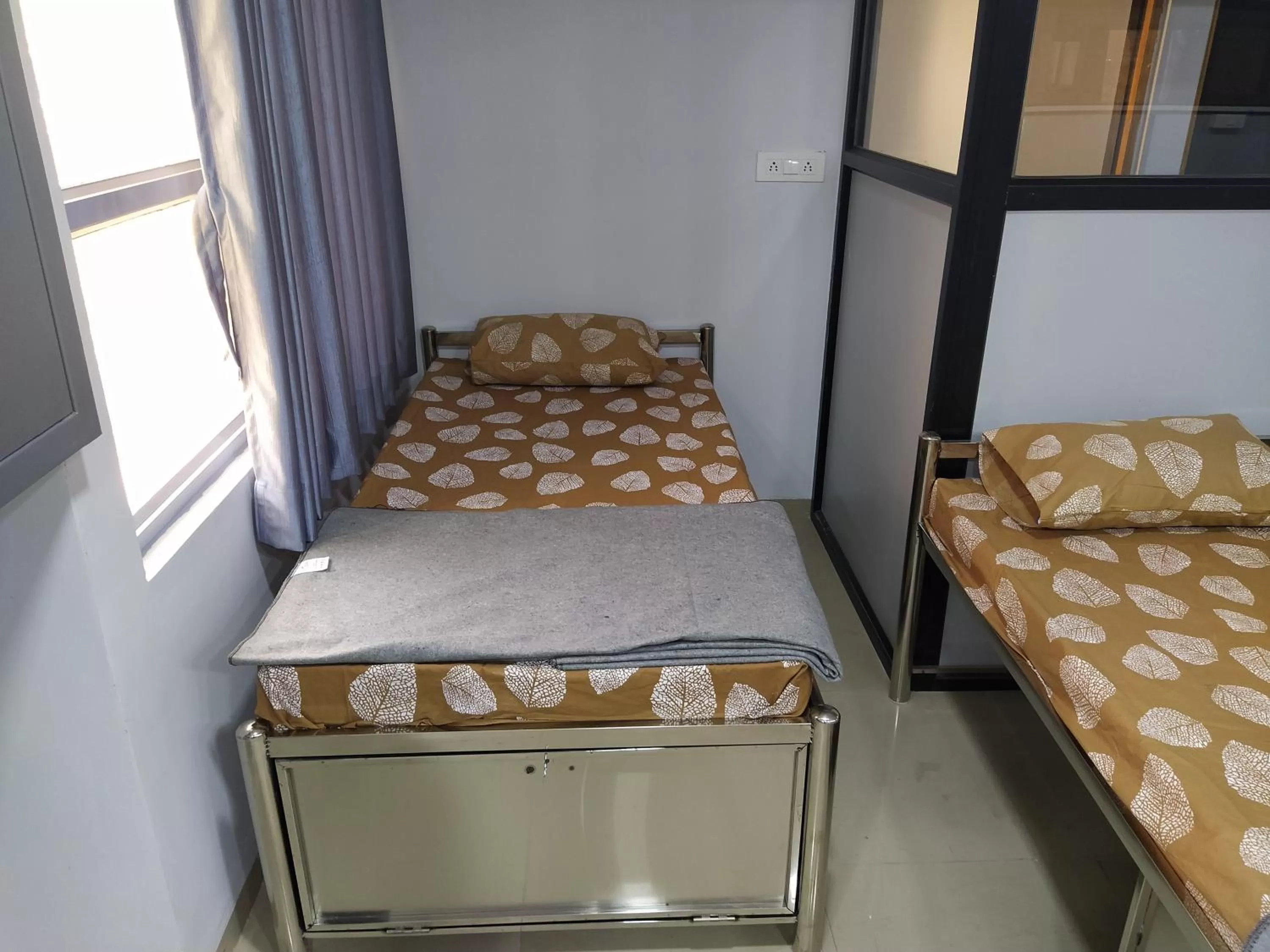 Bed in Shiv Sai Dormitory