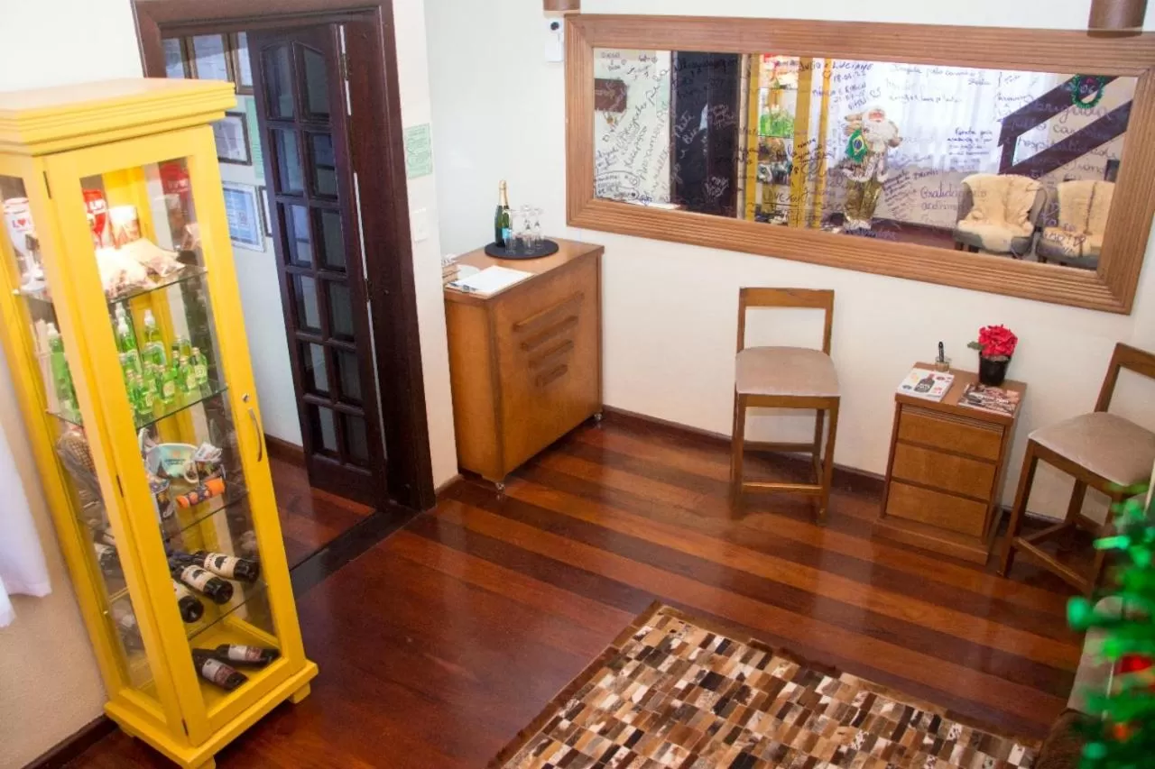 Lobby or reception in Pousada Green House by Conrado Vitali