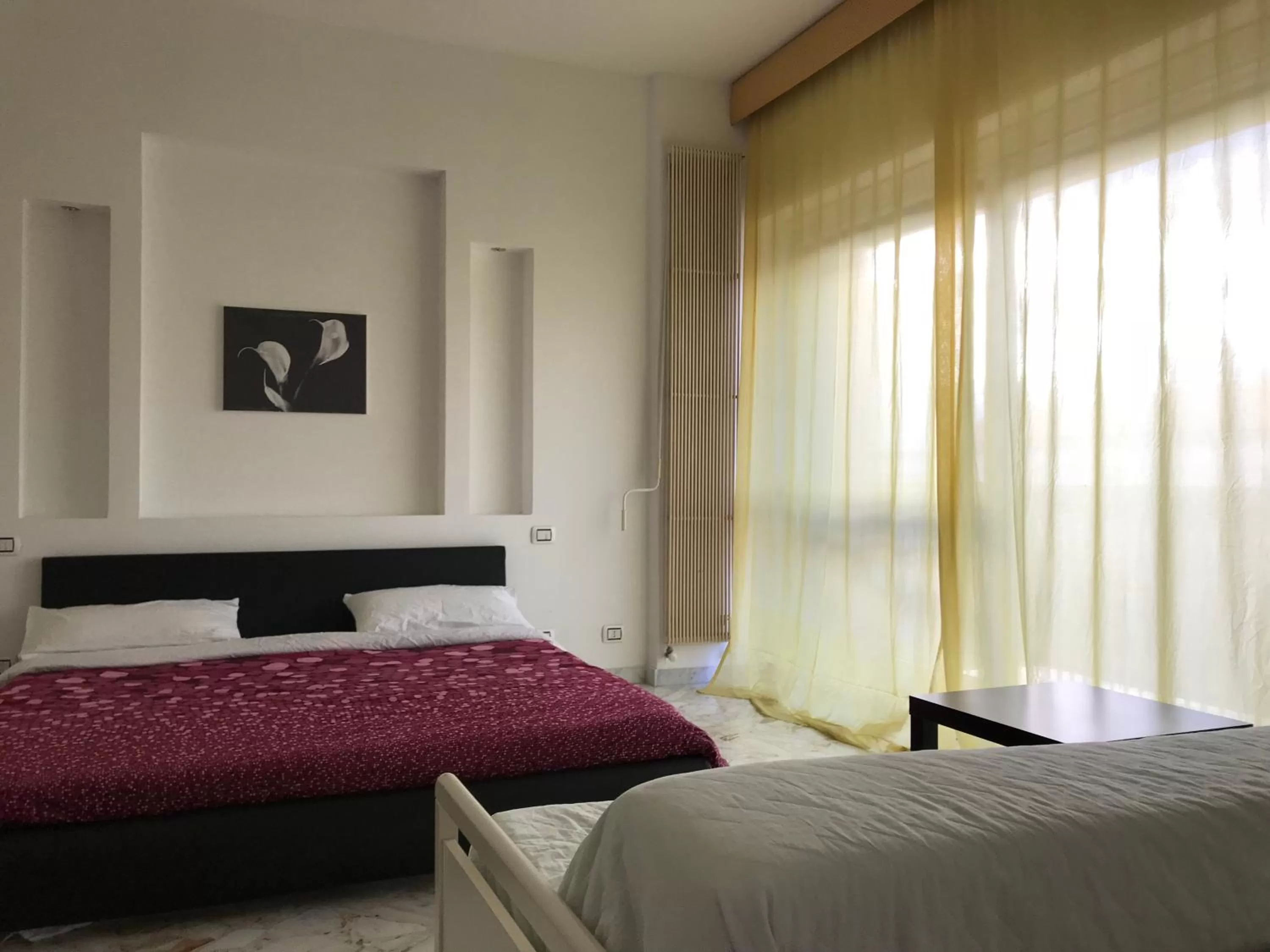 Bed in CAVOUR 124 -guest-room-