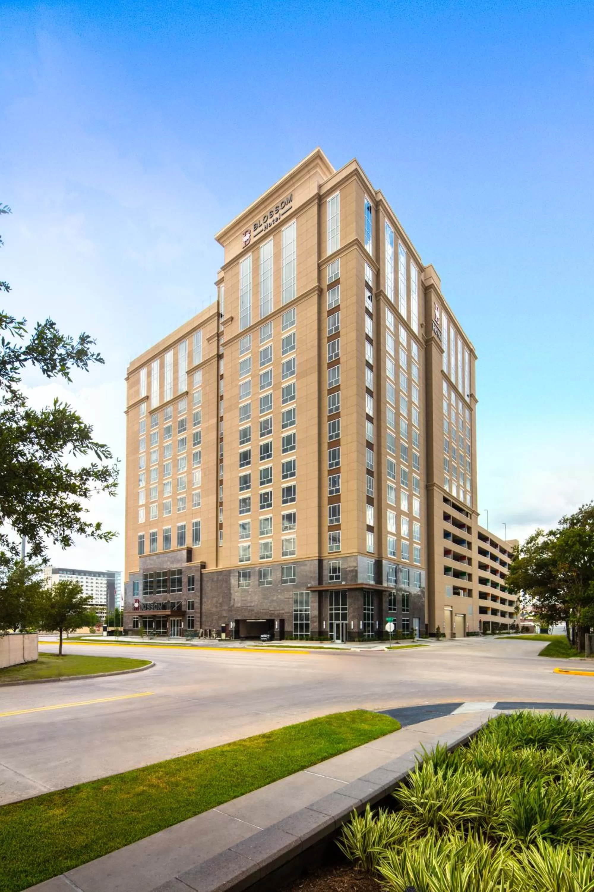 Property building in Blossom Hotel Houston, Curio Collection by Hilton