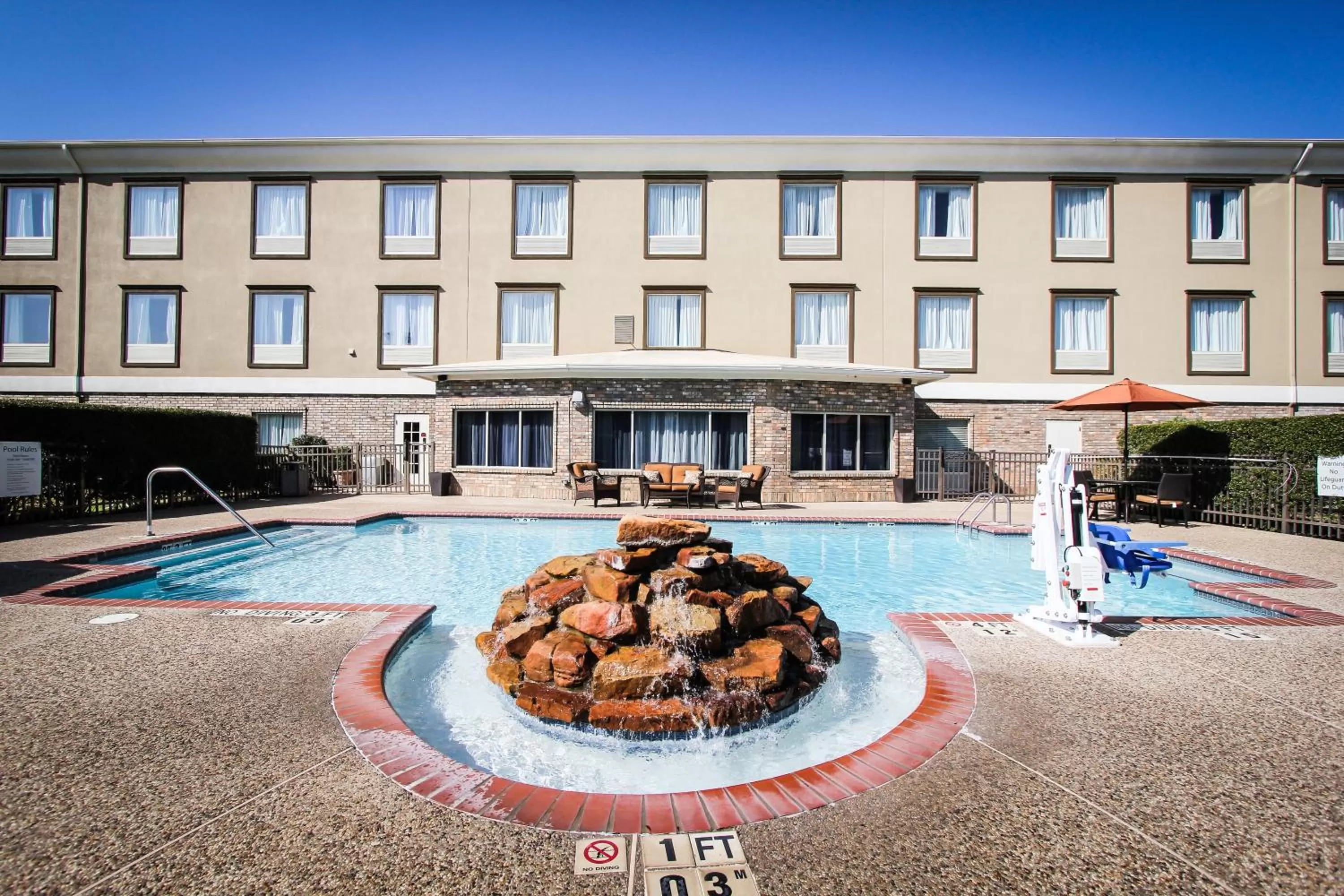 Swimming pool in Holiday Inn Express Hotel & Suites Nacogdoches by IHG