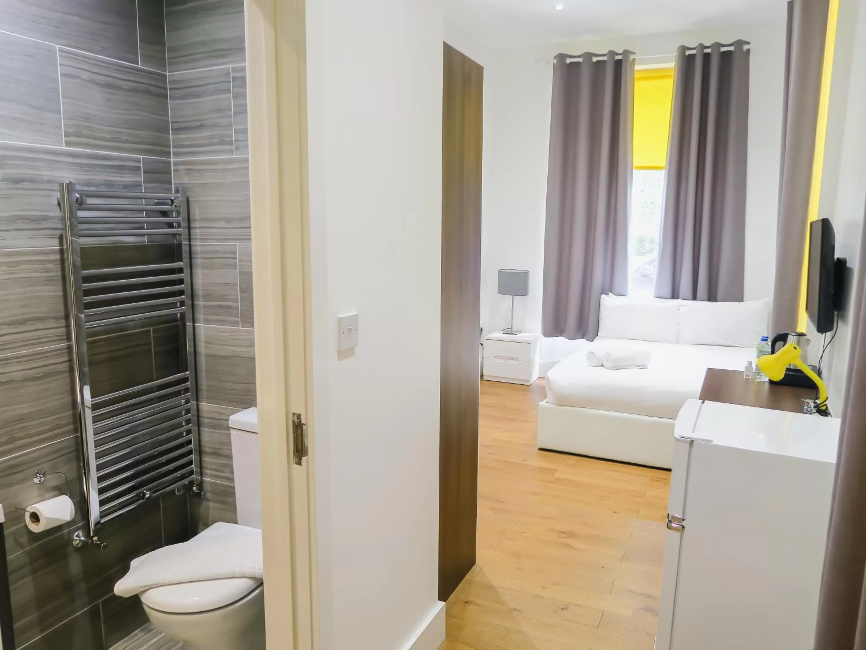 Bed, Bathroom in TiTiwangsa One Accomodation at Paddington