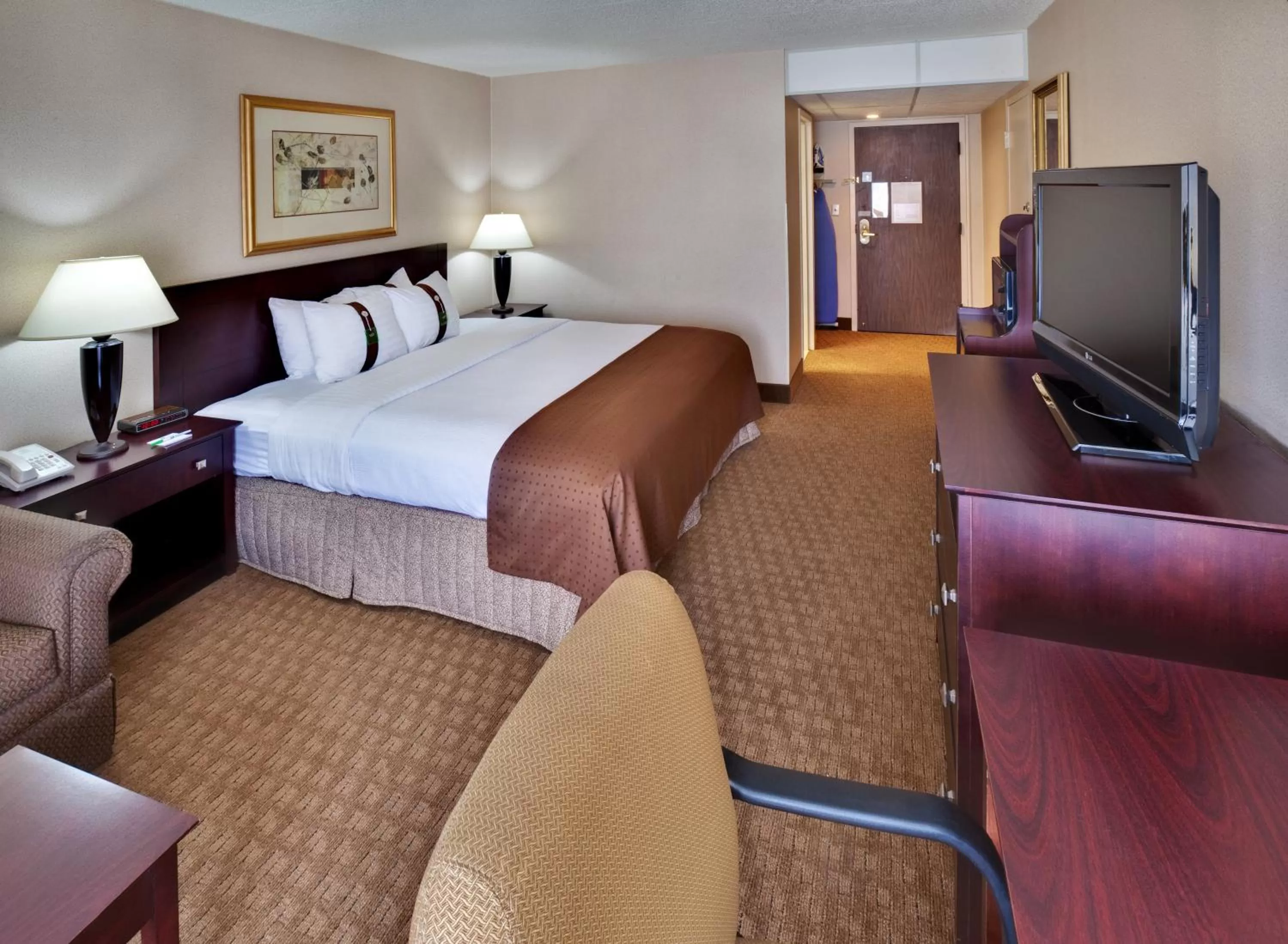 Photo of the whole room, Bed in Ramada by Wyndham Midtown Grand Island