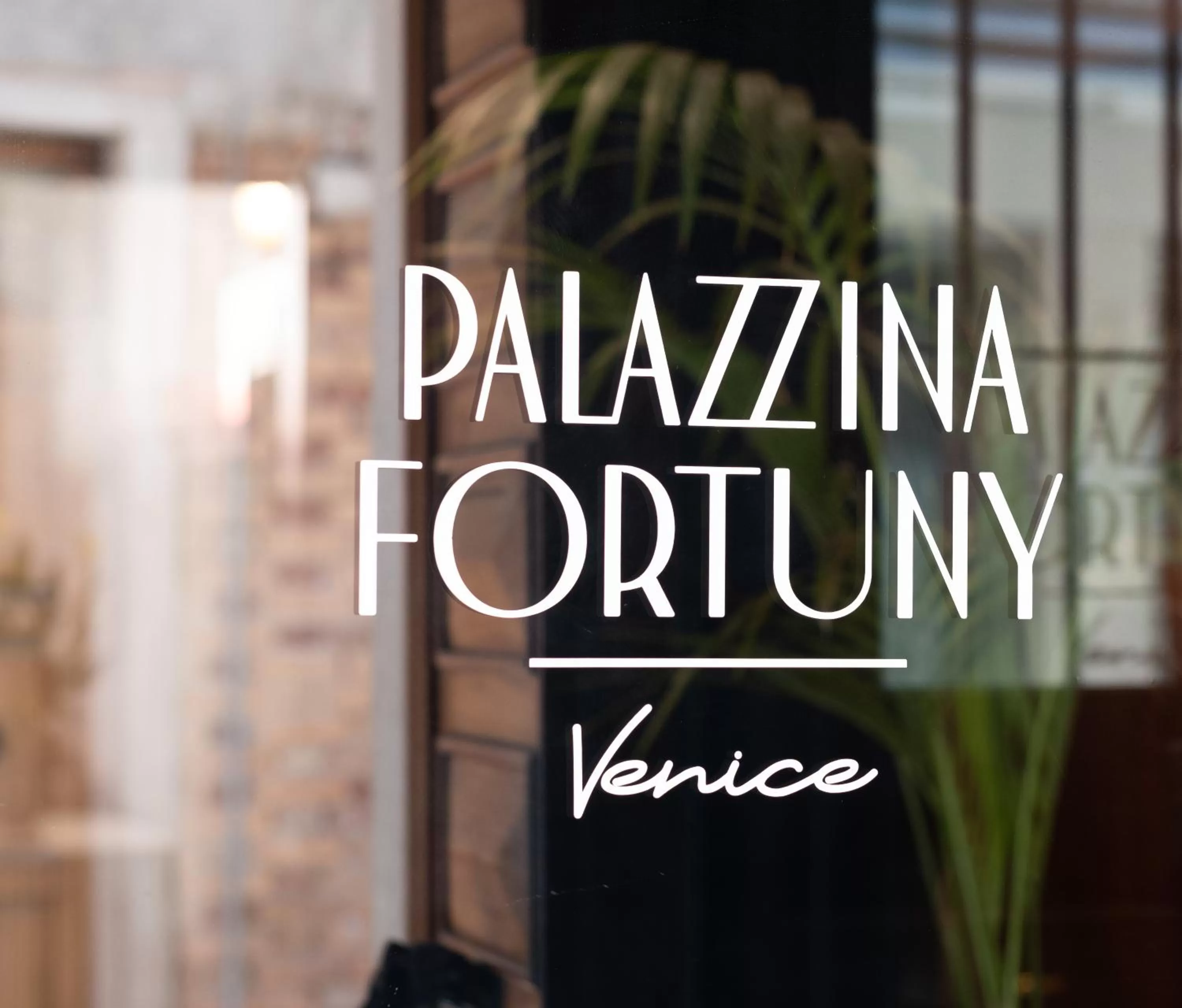 Property logo or sign in Palazzina Fortuny