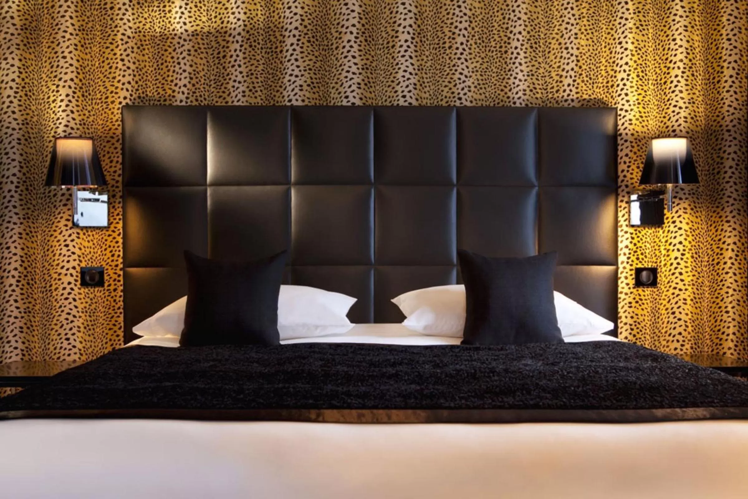 Bed in First Hotel Paris Tour Eiffel