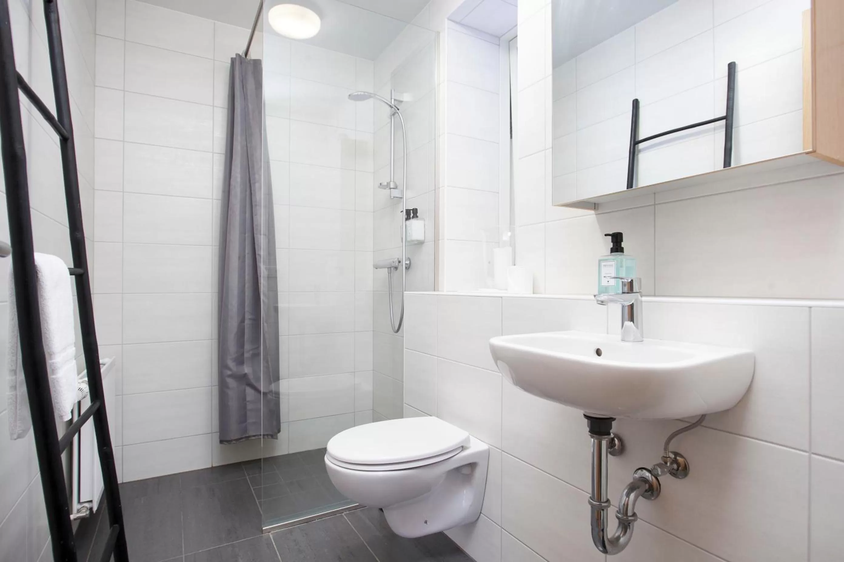 Bathroom in Tyr Apartments by Heimaleiga