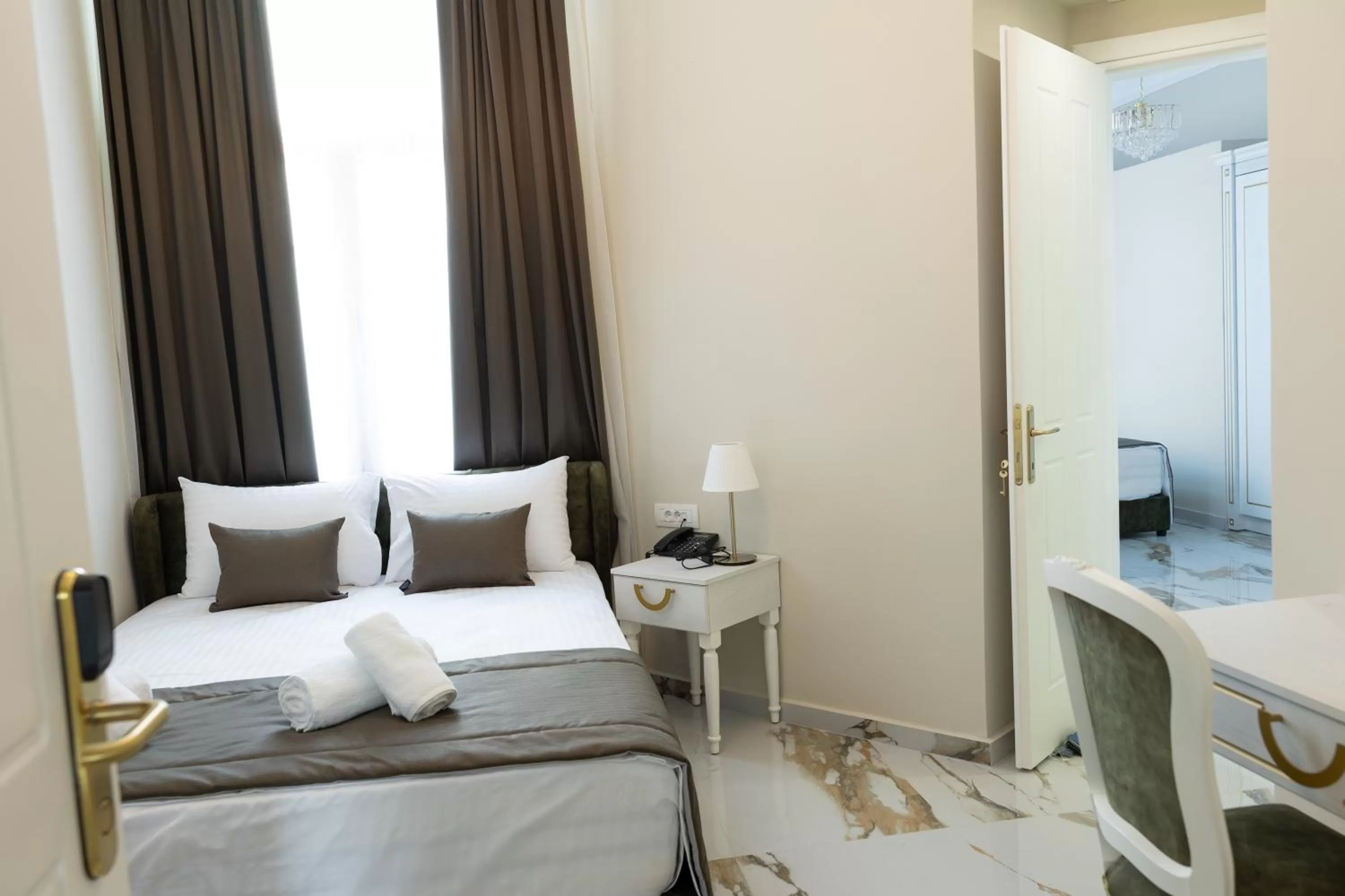 Bed in Modern Revival Luxury Hotel