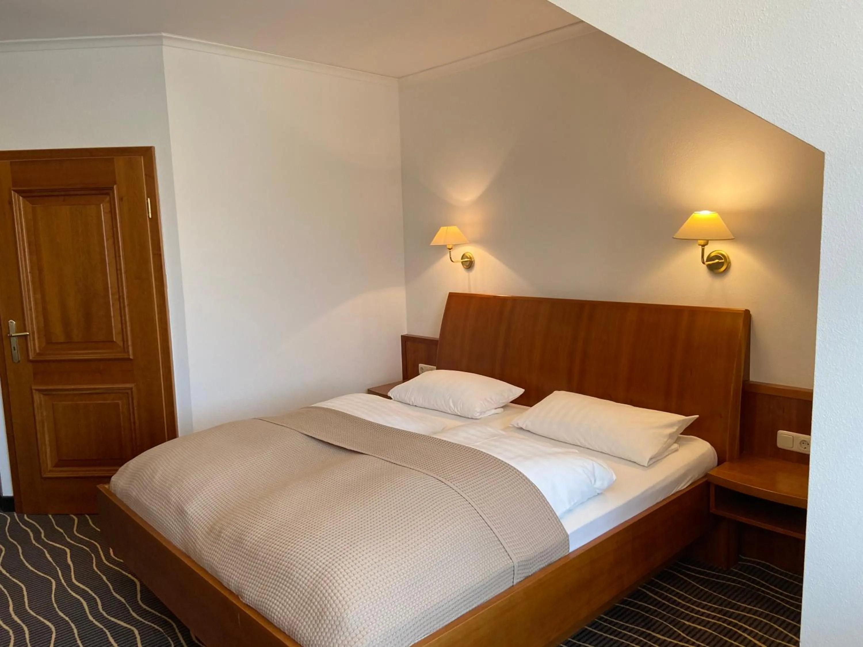 Photo of the whole room, Bed in Hotel Zur Schönen Aussicht