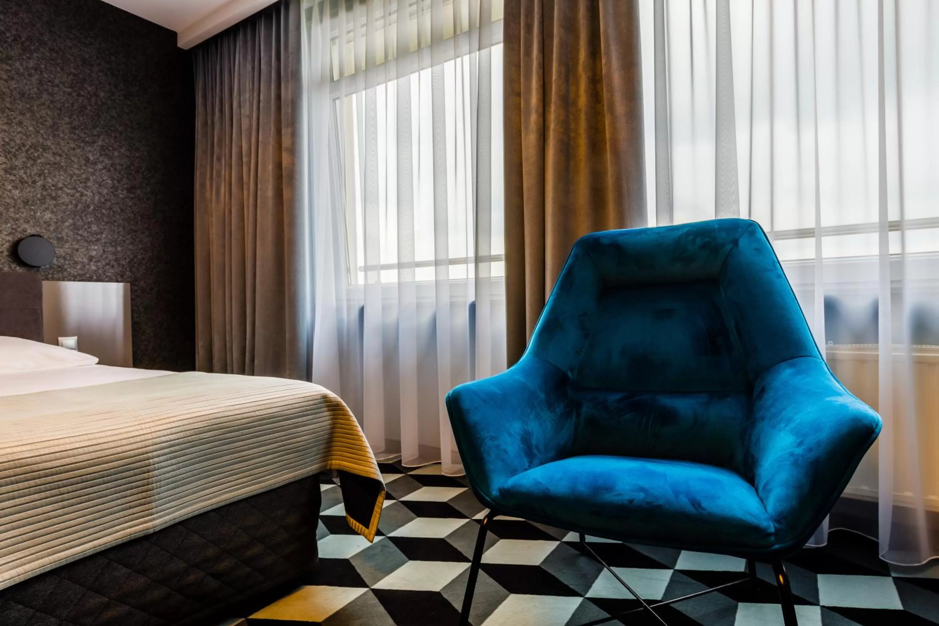 Seating area, Bed in Hotel Wyspiański