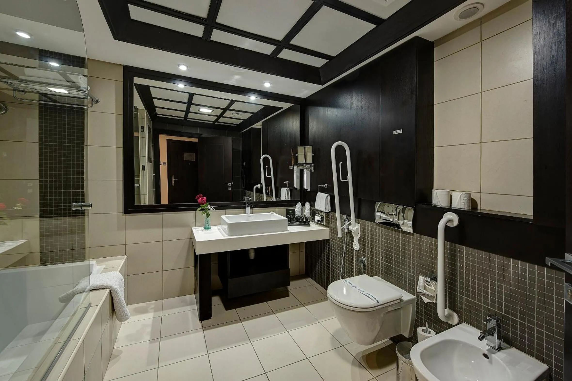 Toilet in Raintree Rolla Hotel