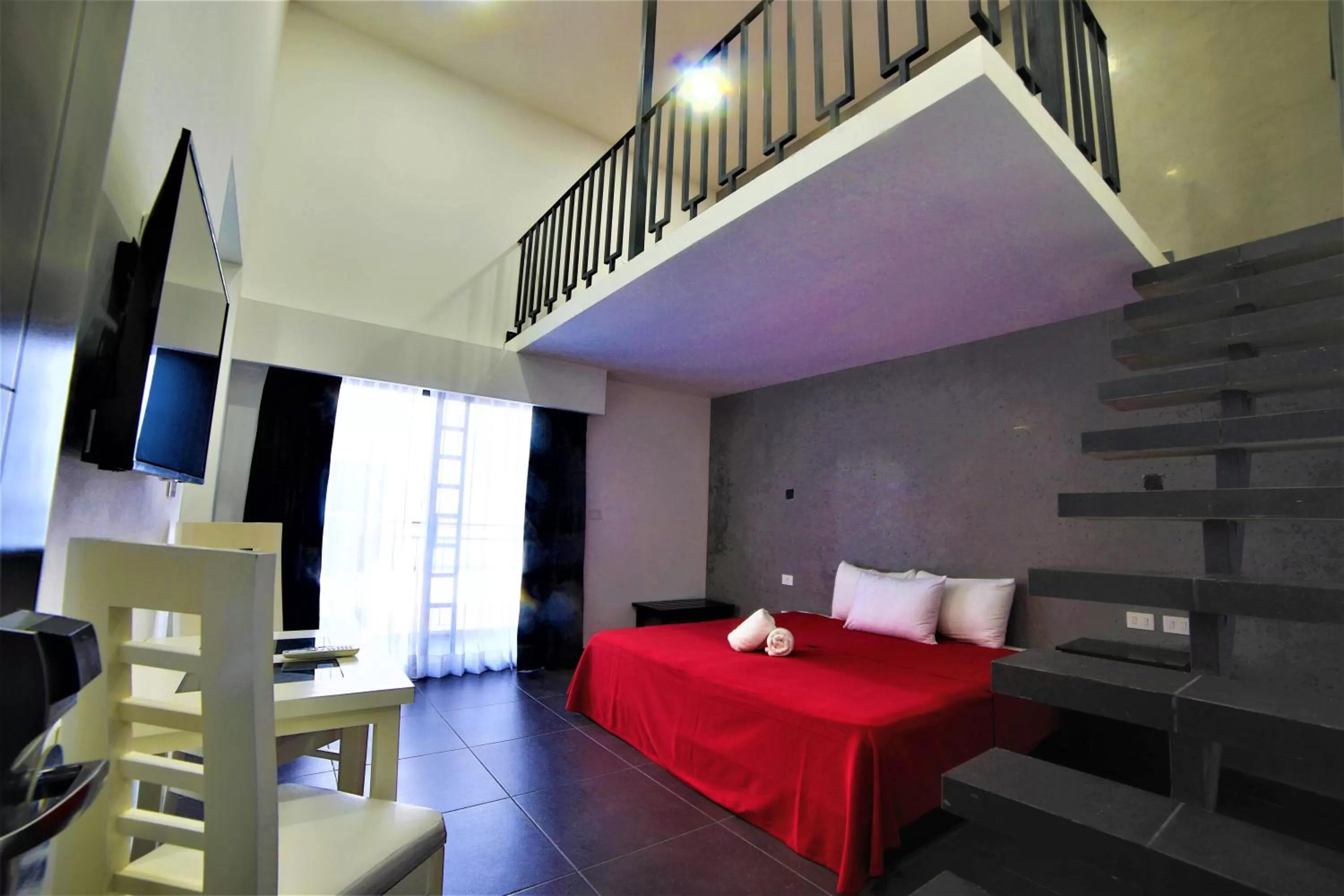 Photo of the whole room, Bed in Hotel Colonial Playa del Carmen