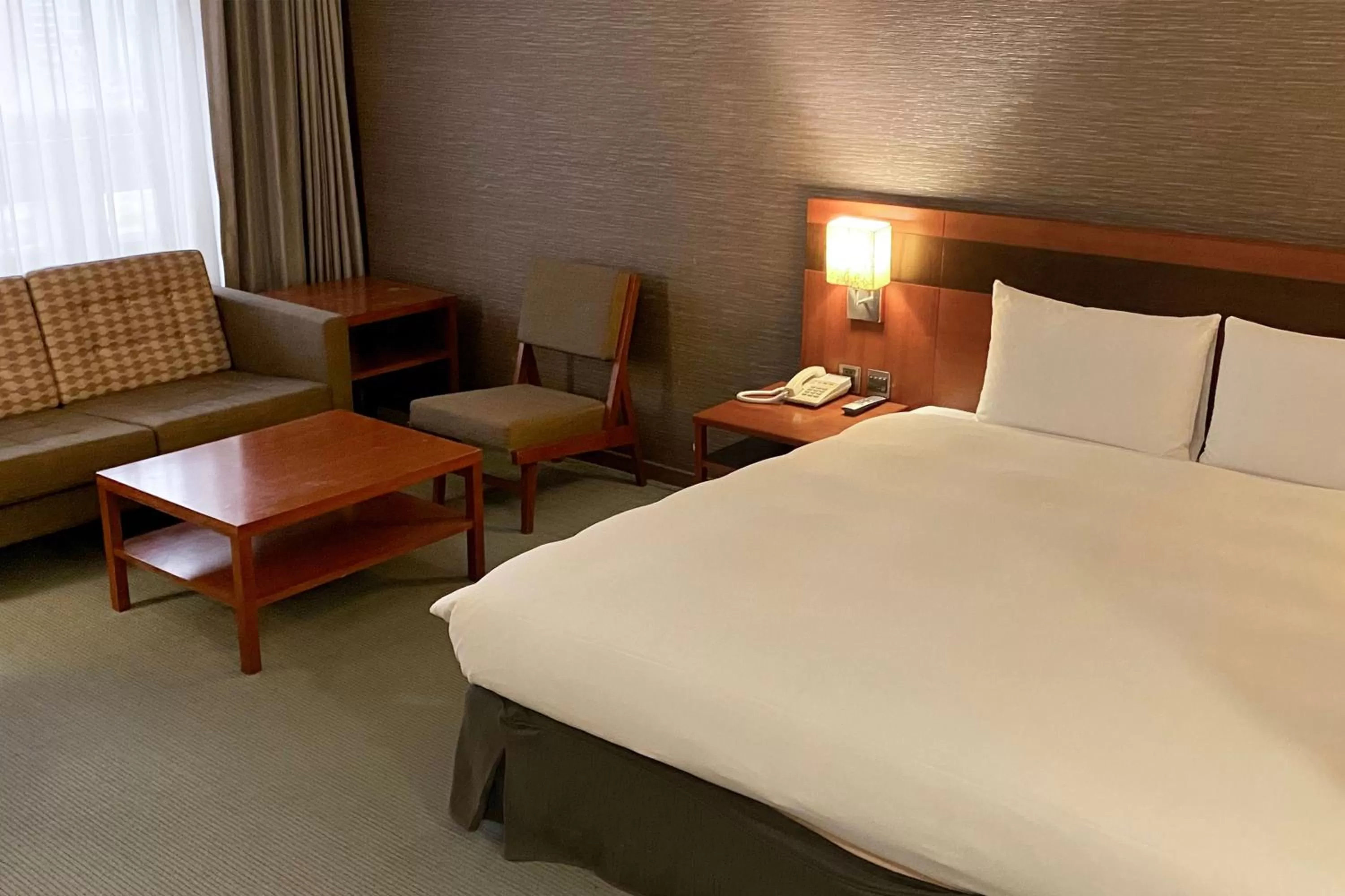 Seating area, Bed in Guide Hotel Hsinchu Zhongyang