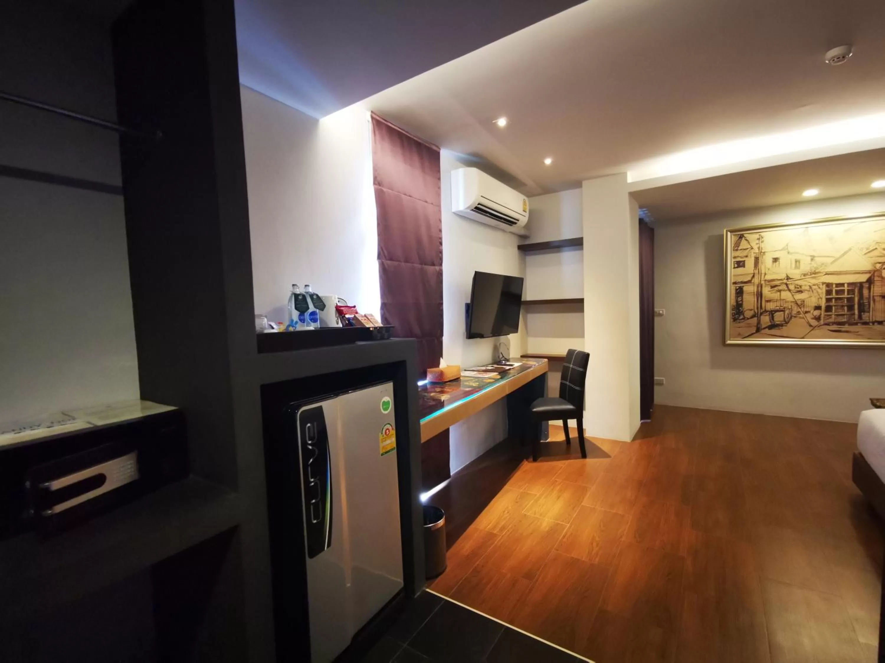 Communal lounge/ TV room in Mandy Nok Hotel