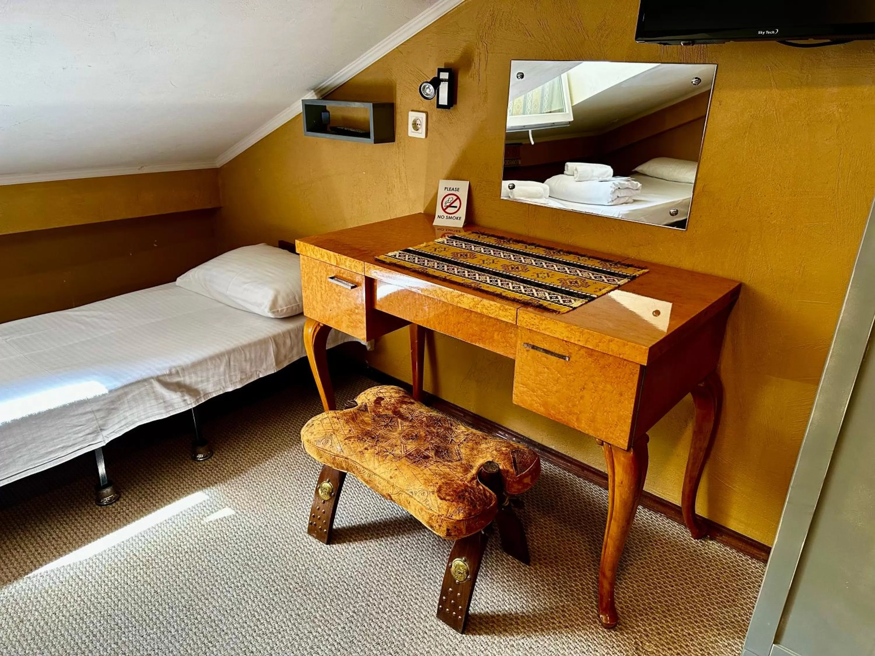 Bed in Kindli Boutique Hotel