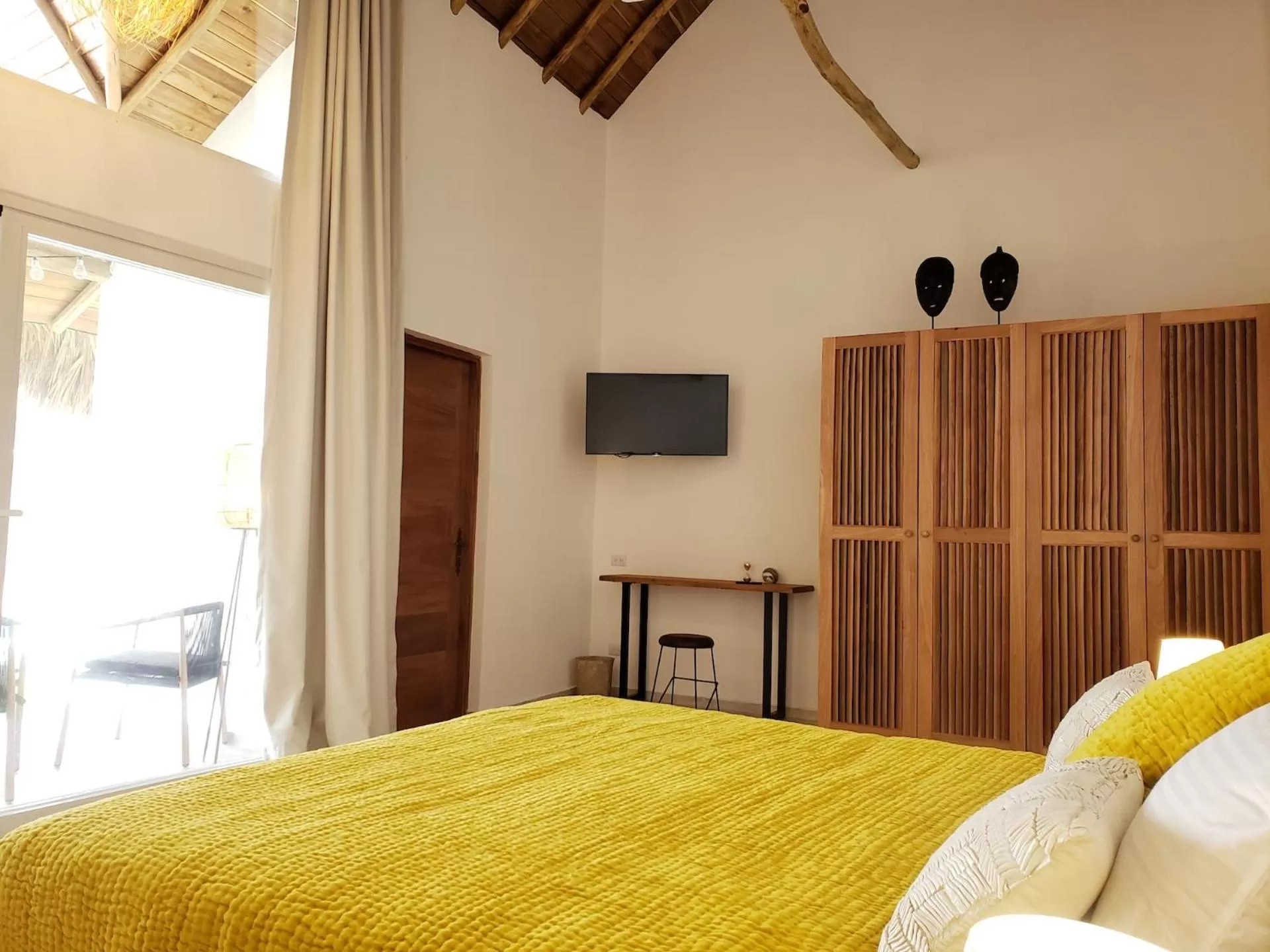 Bed in TAKUMA BOUTIK HOTEL