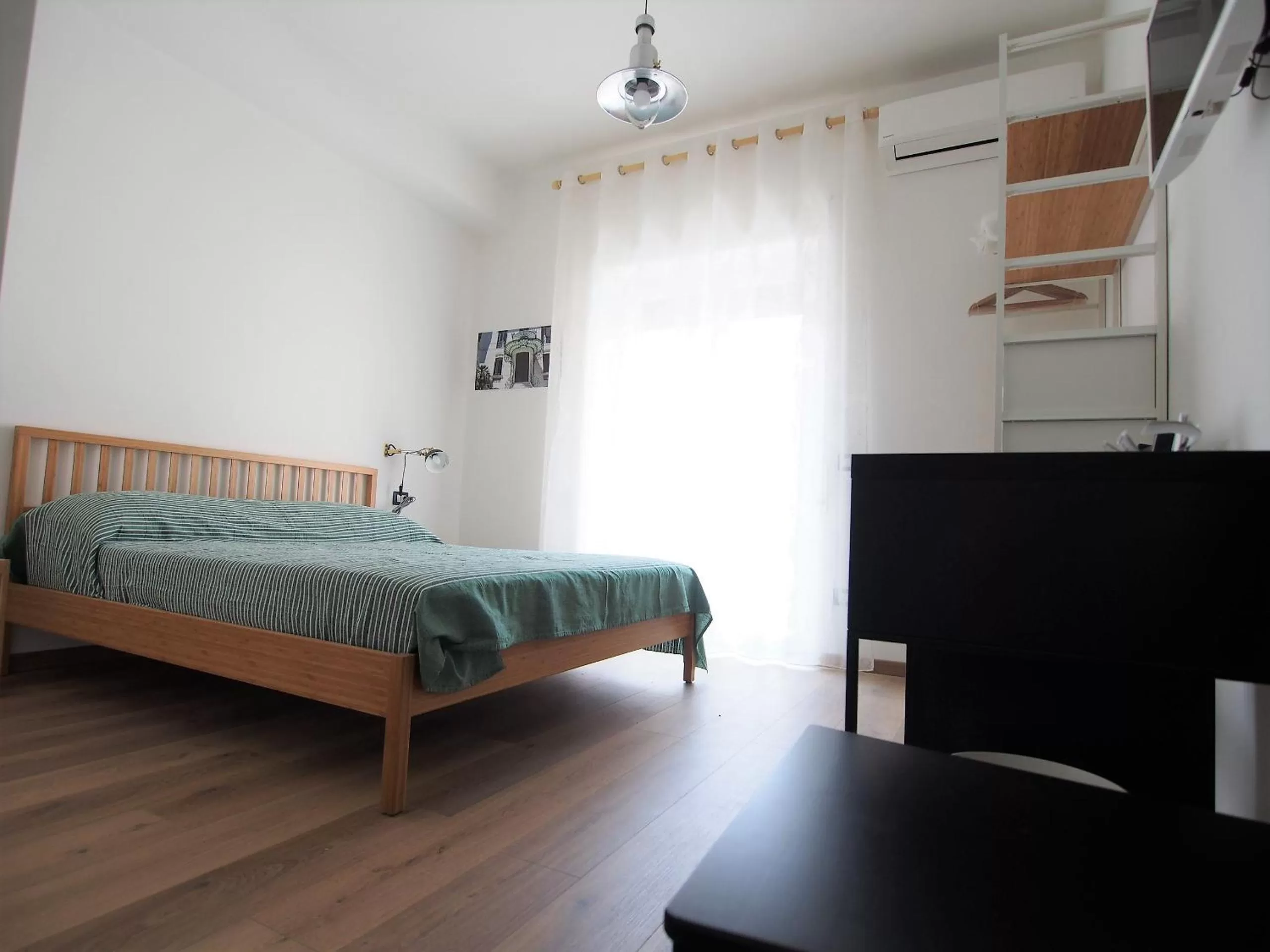 Bed in Bella Vita Rooms